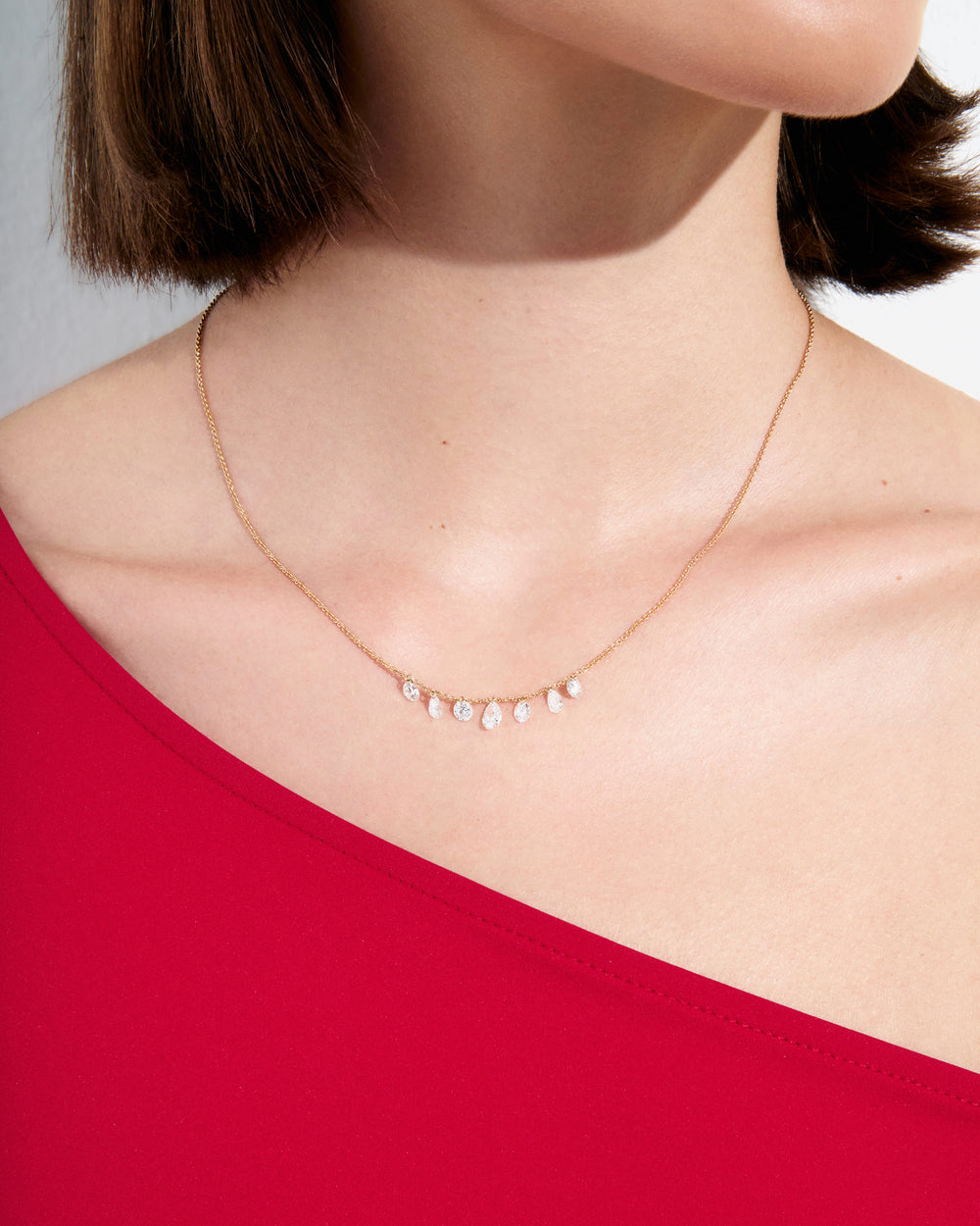 Round and Pear Drilled Diamond Necklace