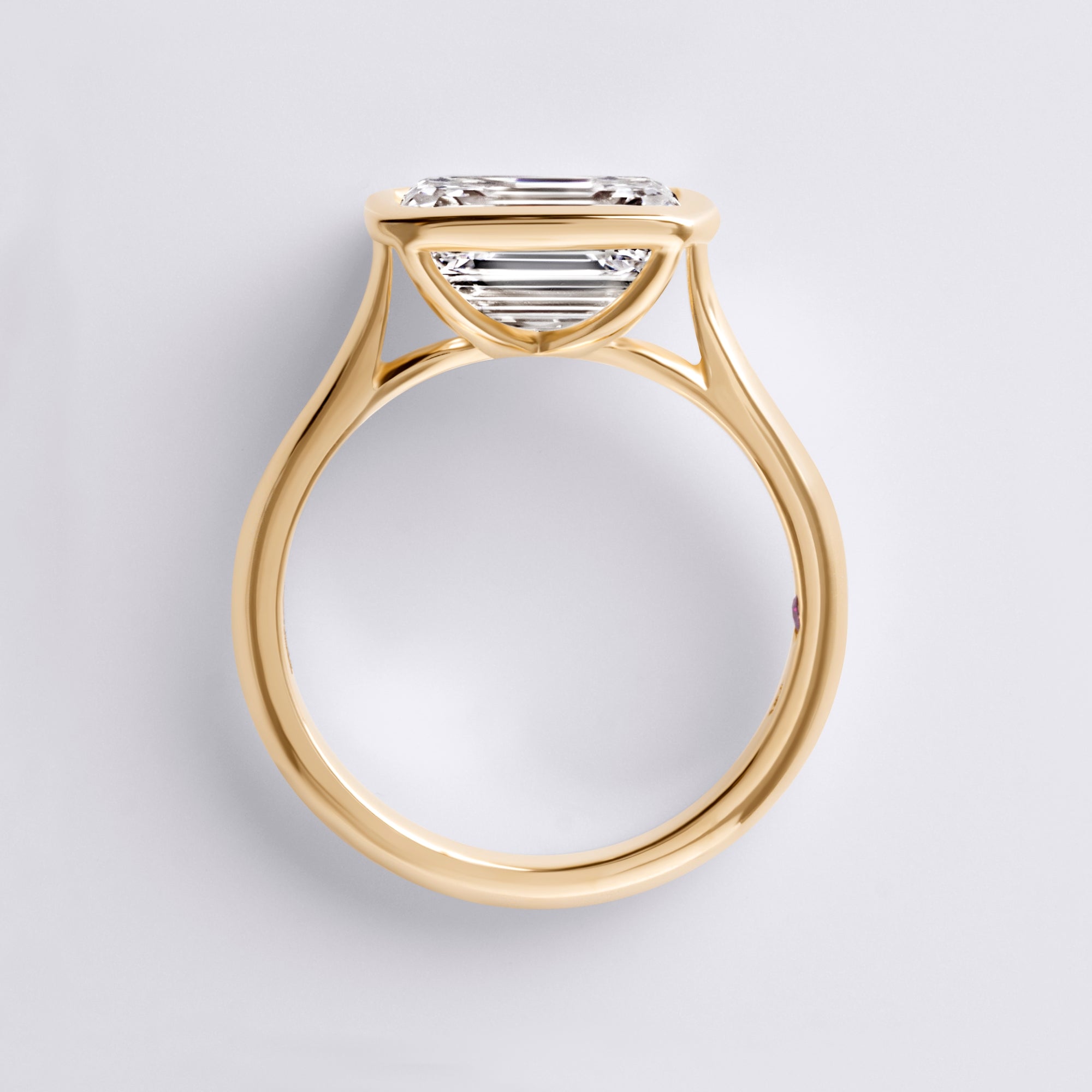 Lori 3.07CT Emerald East/West Bezel Set Engagement Ring, Yellow Gold