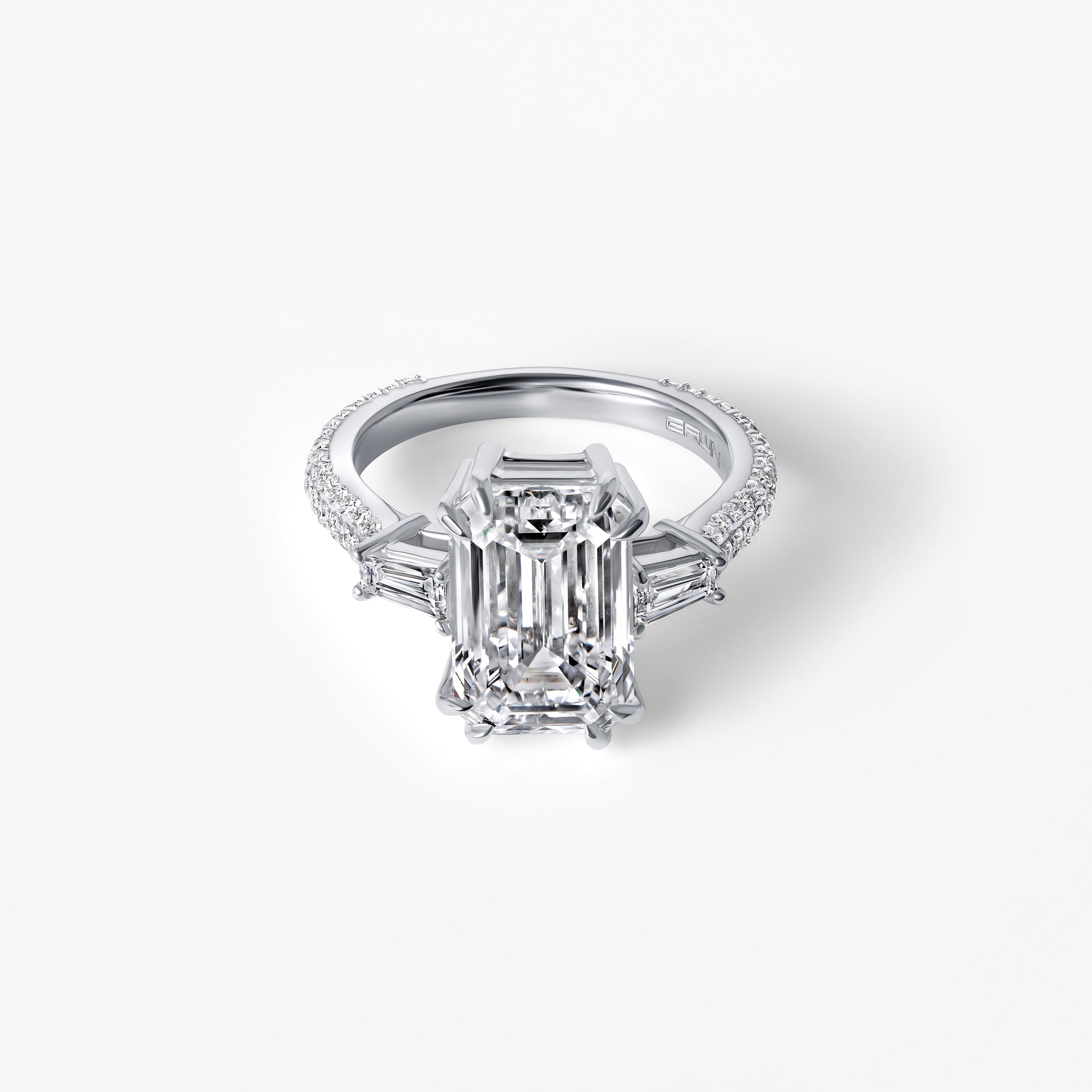 5.11CT Emerald Three Stone And Pavé Engagement Ring