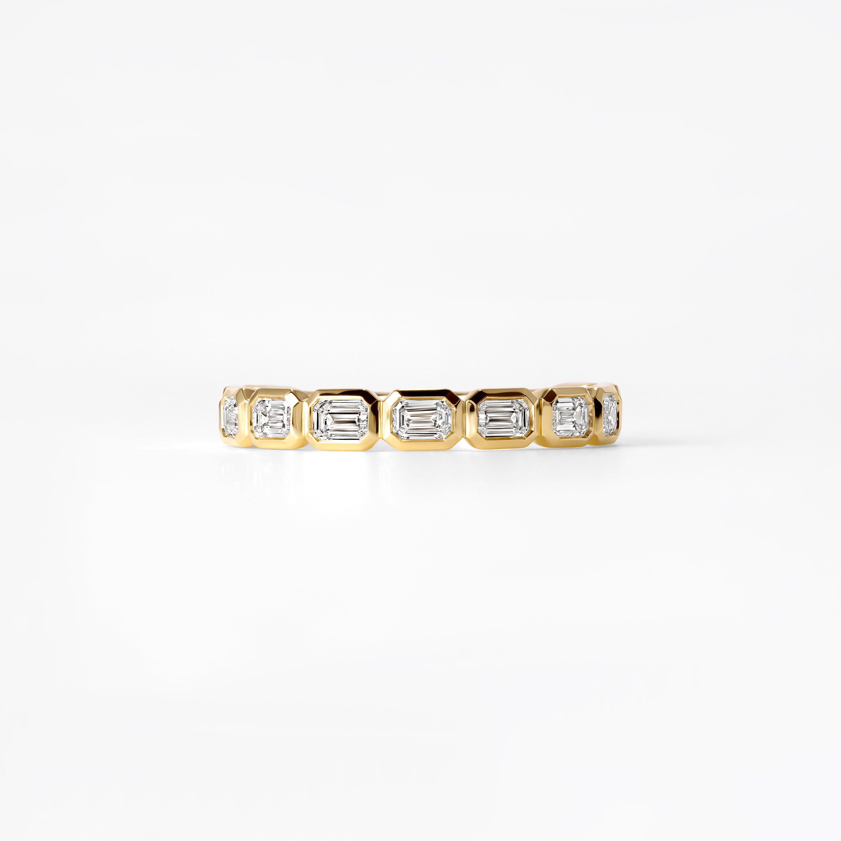Emerald Cut Diamond East West Bezel Set Three Quarter Eternity Band