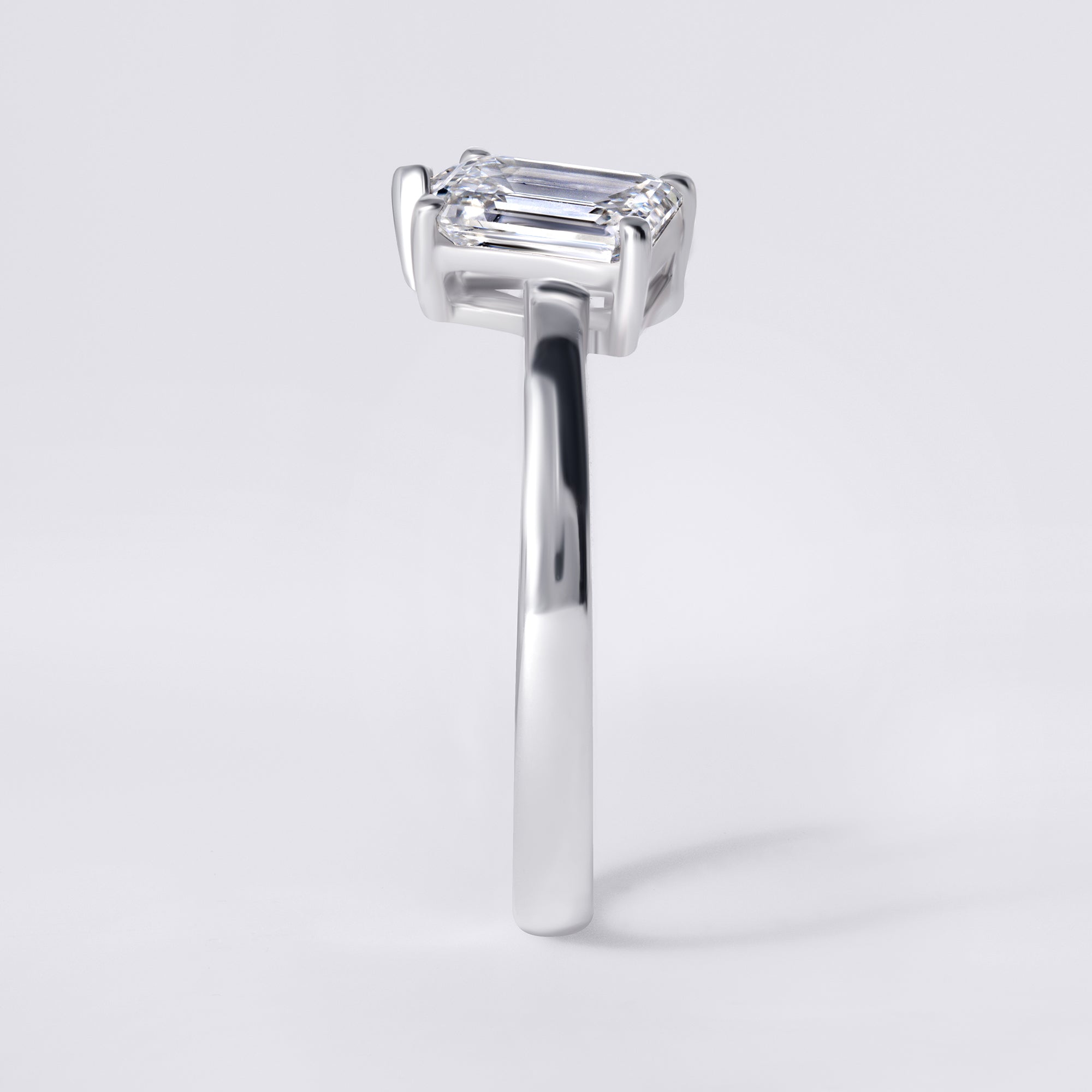 Pear and Emerald Cut Diamond Toi et Moi Ring