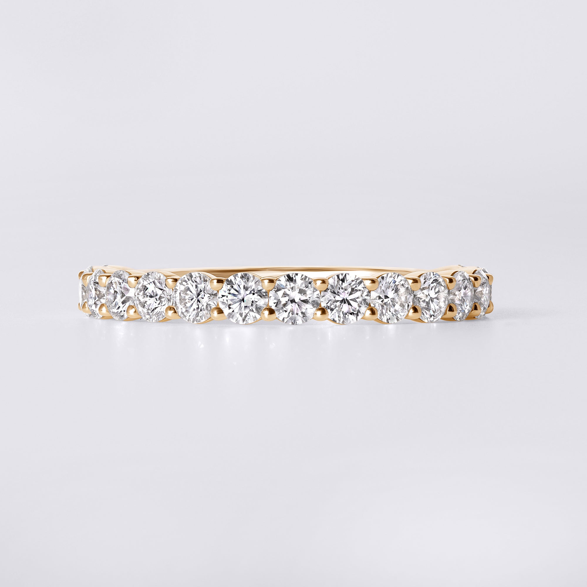 Round Diamond Shared Prong Set Three Quarter Eternity Band