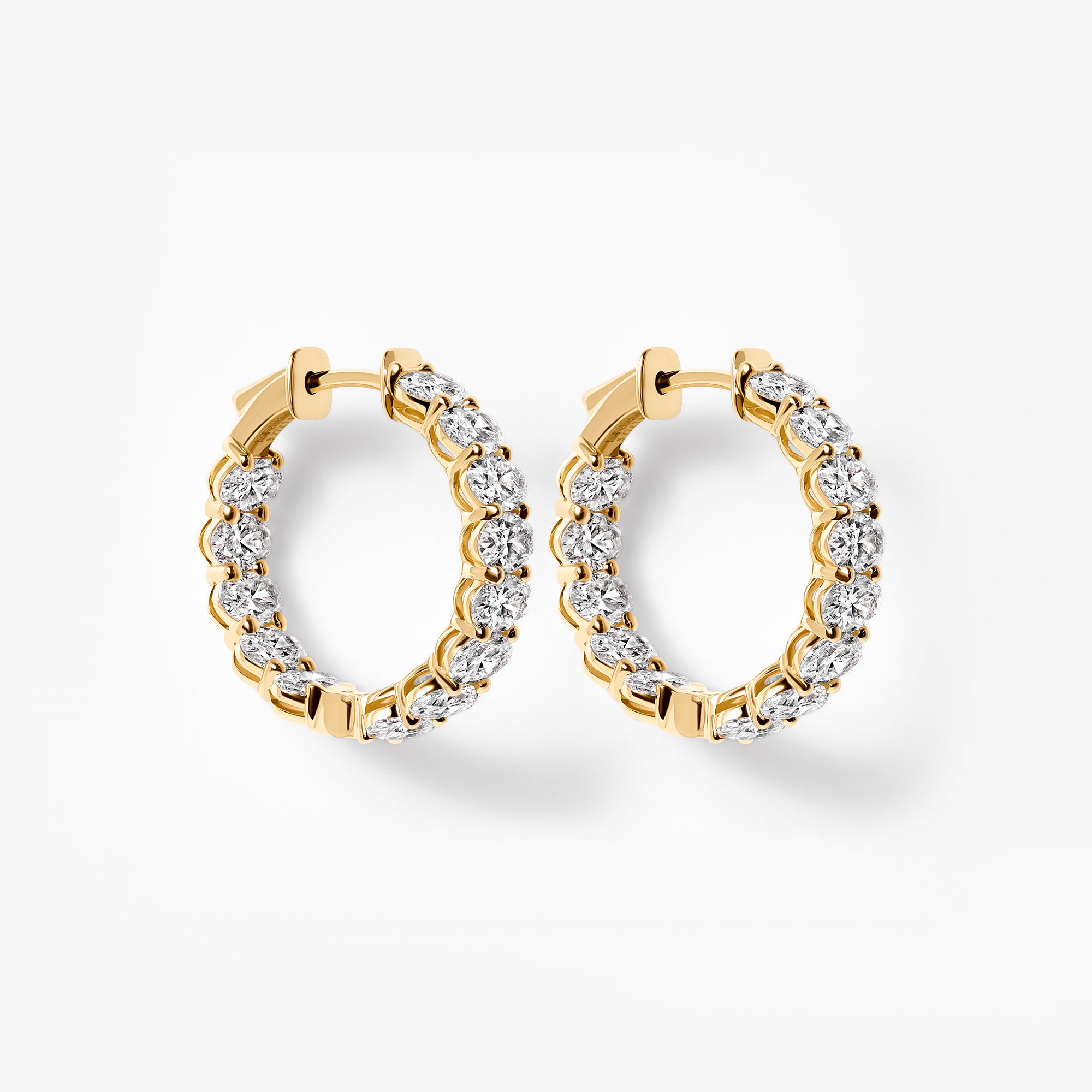 Oval Diamond Inside Out Huggie Earrings