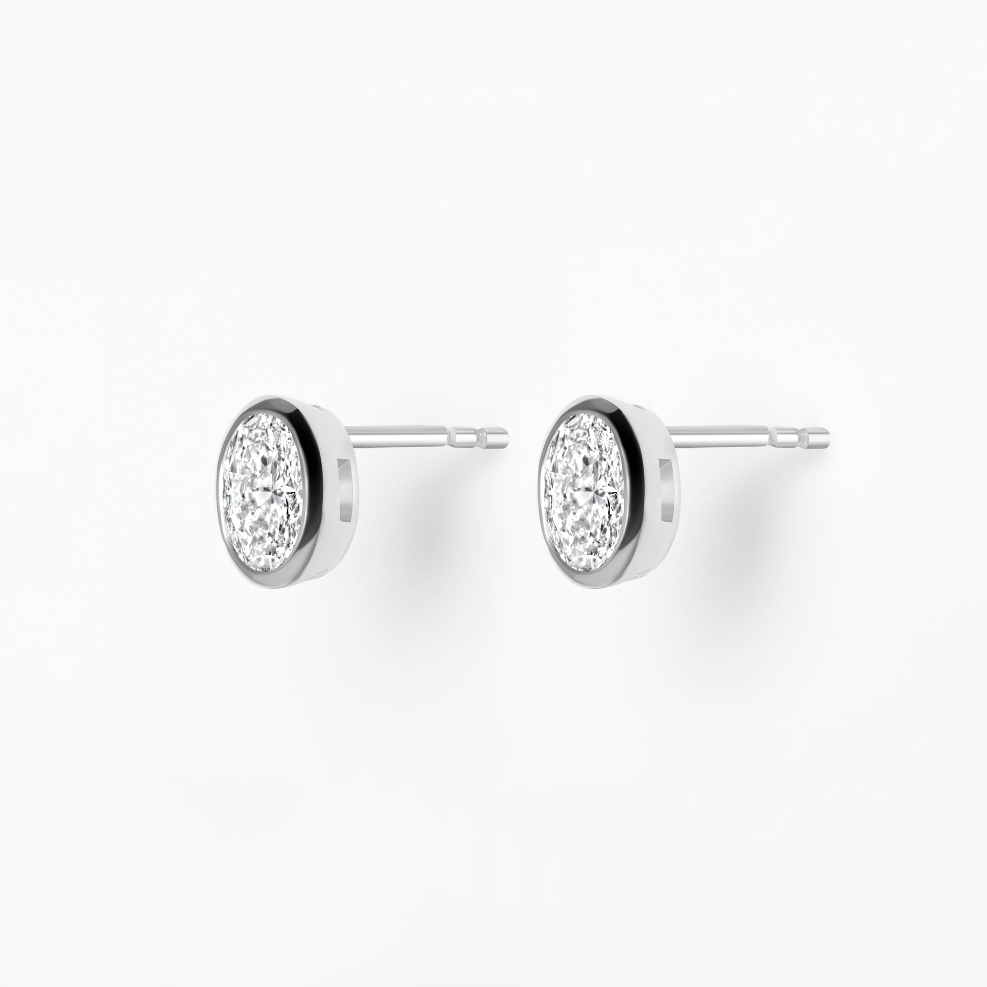 Bezel Set Oval Diamond Stud Earrings