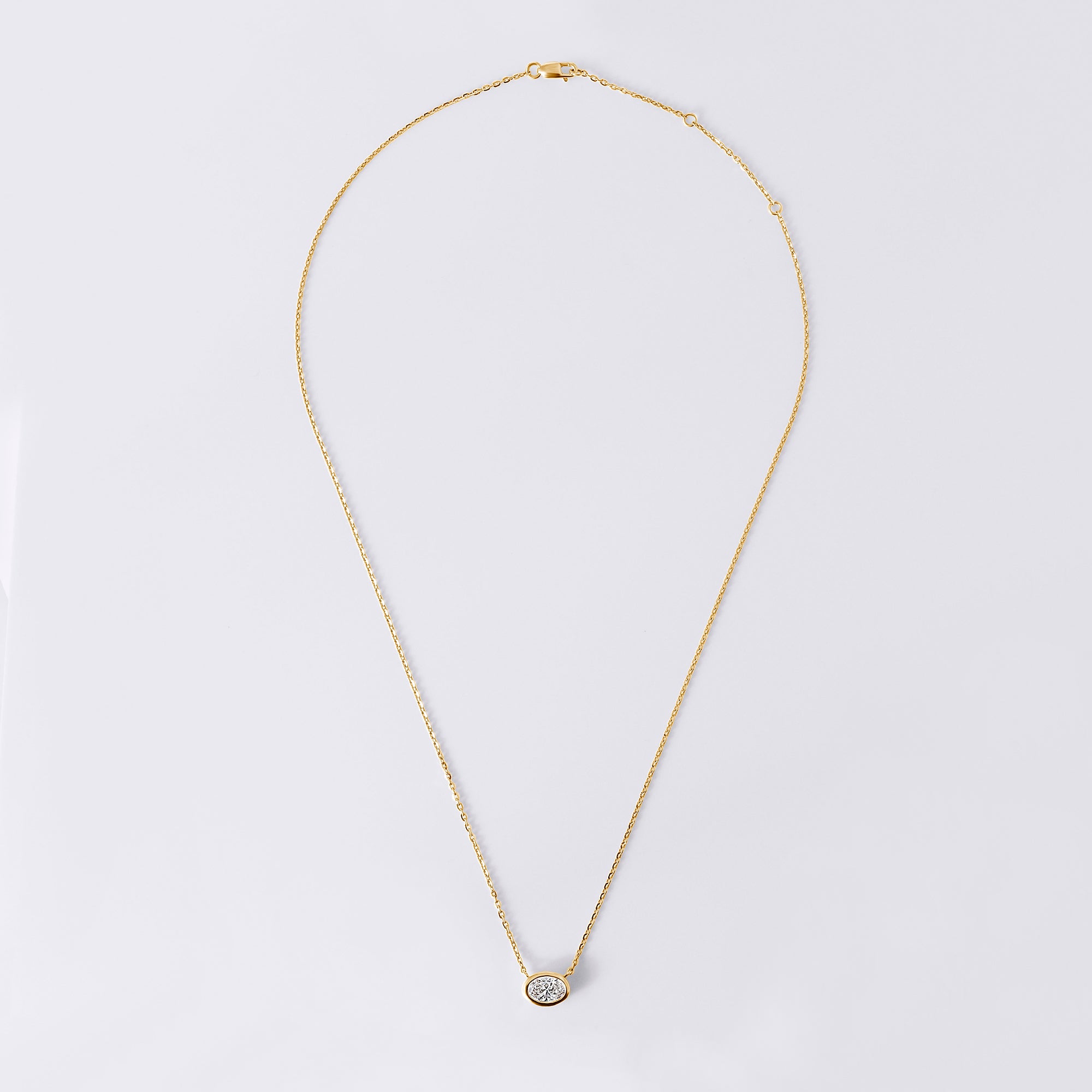 Oval Diamond Bezel Set Pendant Necklace