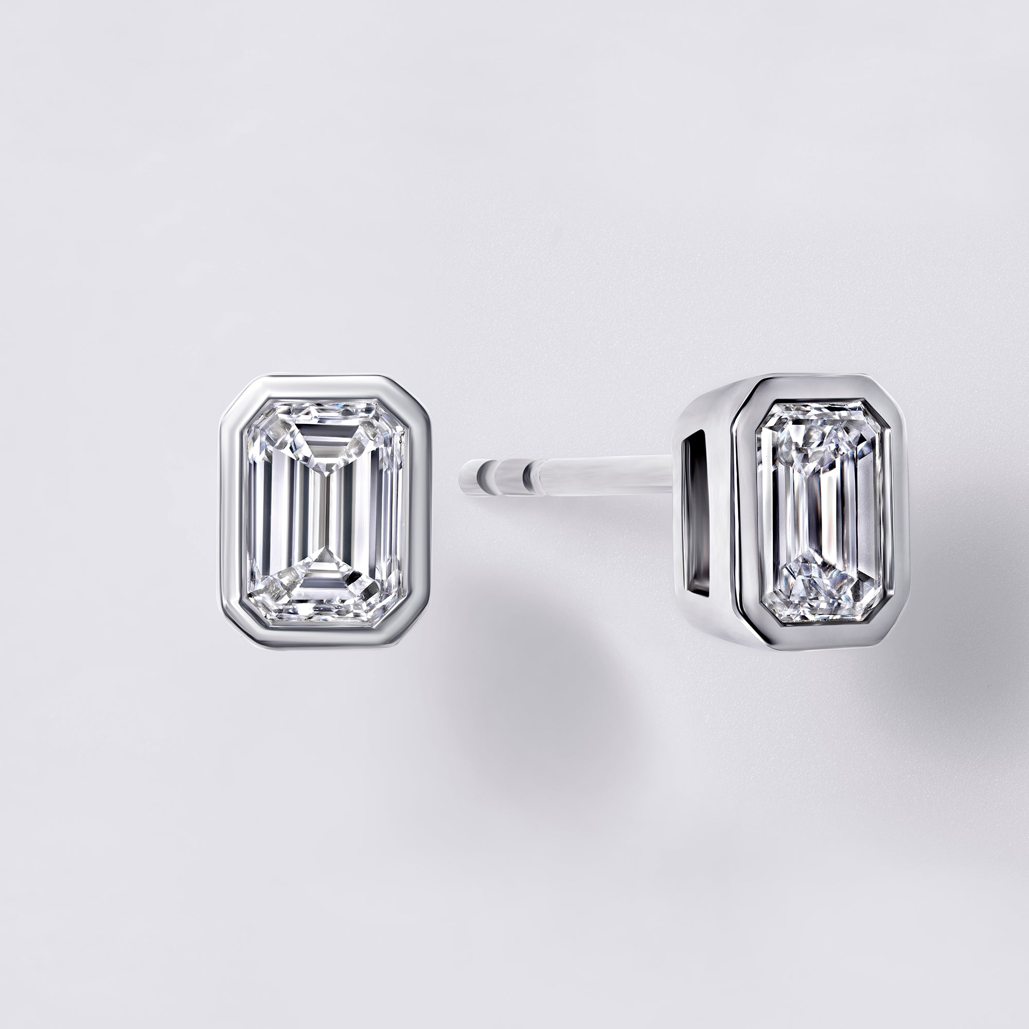 Bezel Set Emerald Cut Diamond Stud Earrings
