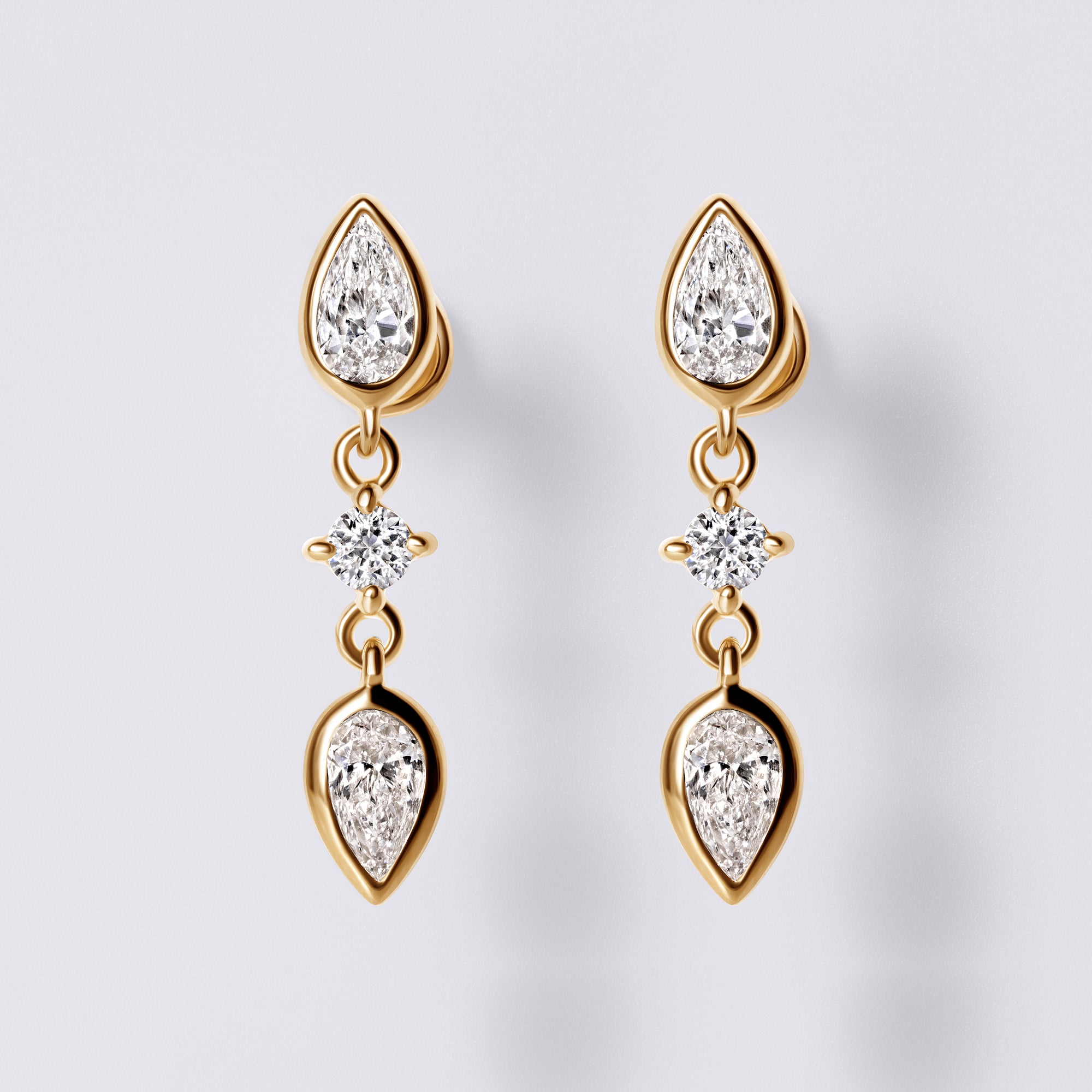 Pear Diamond Bezel Set Triple Drop Earrings