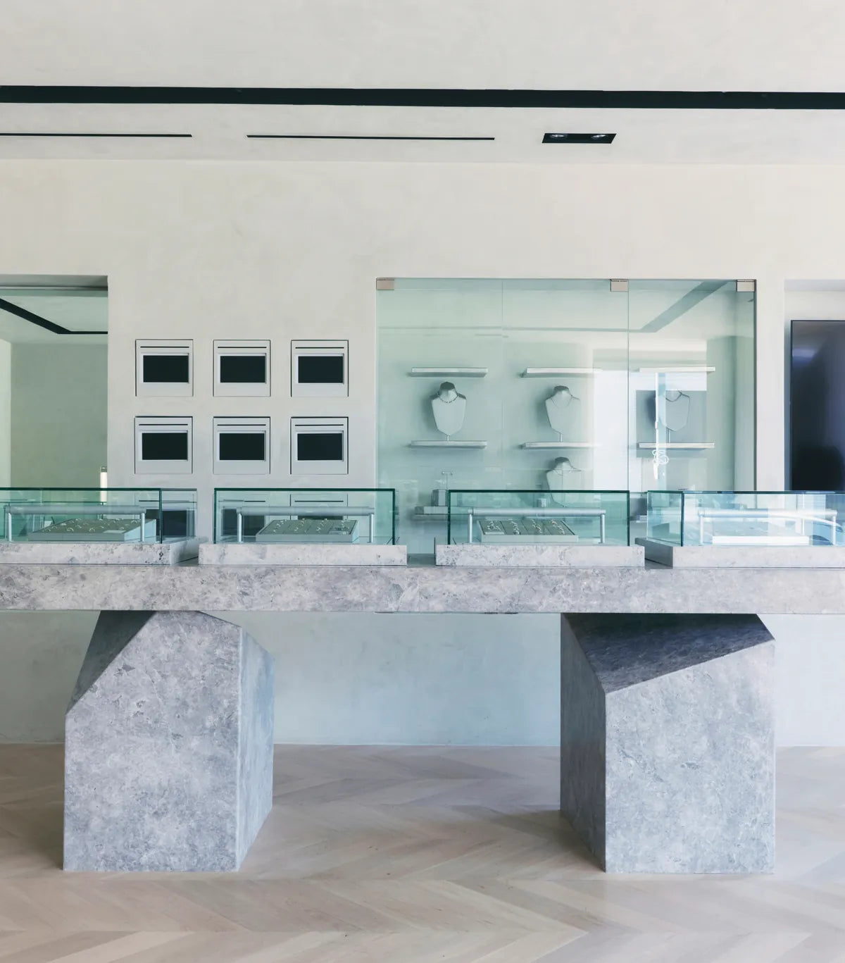 Stone display cases inside the GRWN Los Angeles flagship