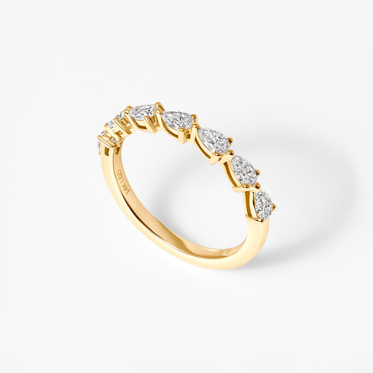 Pear Diamond East West Prong Set Half Eternity Band
