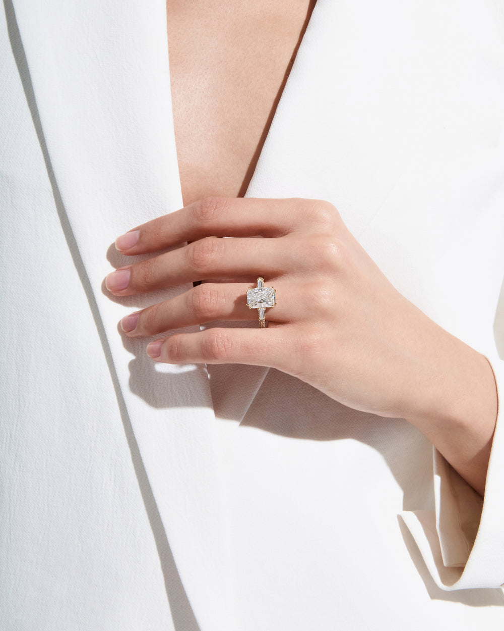 4.05CT Radiant Three Stone and Pavé Engagement Ring