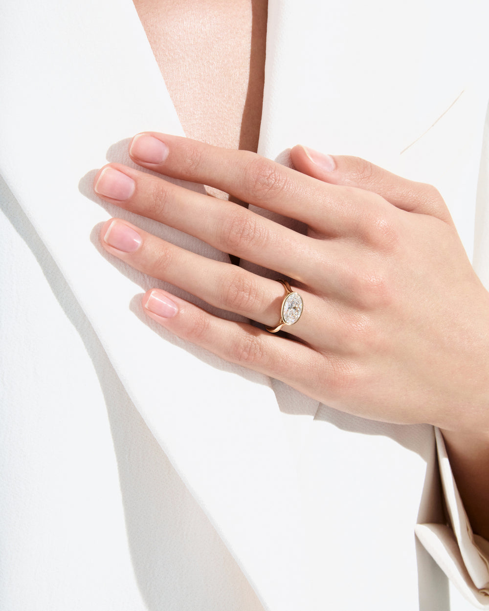 2.04CT Oval East West Bezel Set Engagement Ring