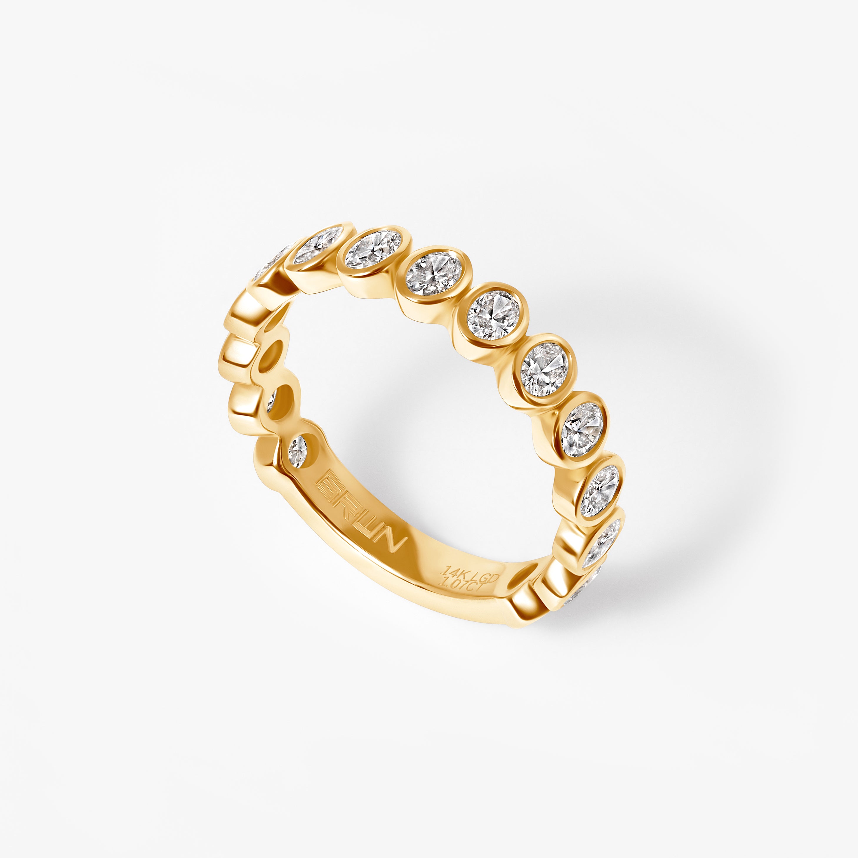 Oval Diamond Bezel Set Three Quarter Eternity Band
