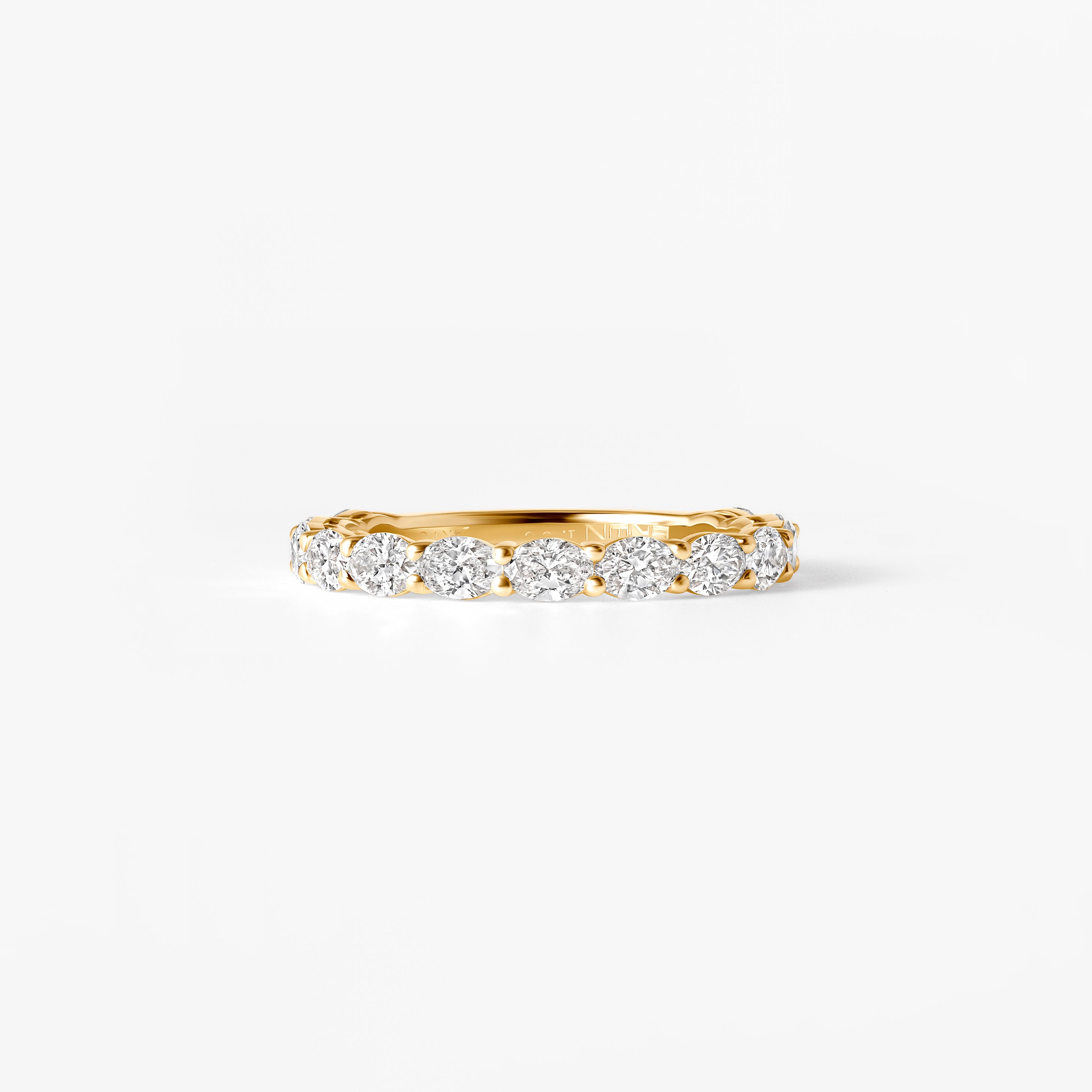 Oval Diamond East West Prong Set Three Quarter Eternity Band