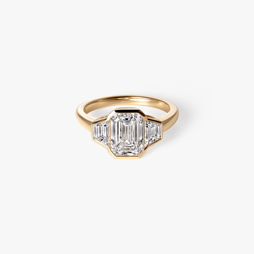 2.07CT Emerald and Trapezoid Bezel Three Stone Engagement Ring