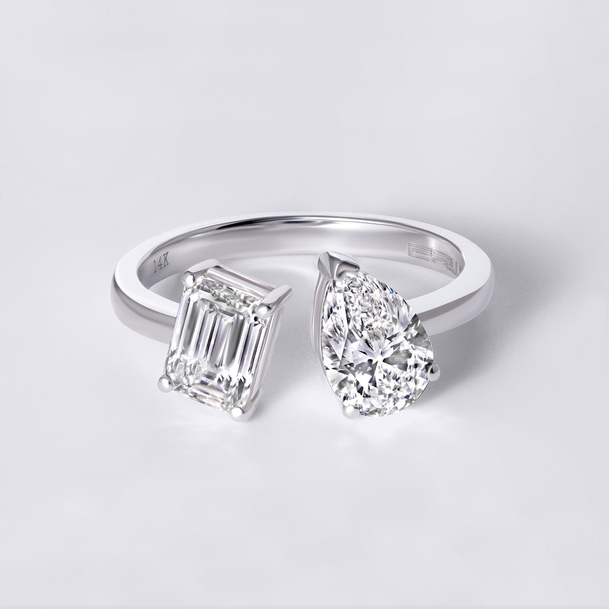 Pear and Emerald Cut Diamond Toi et Moi Ring