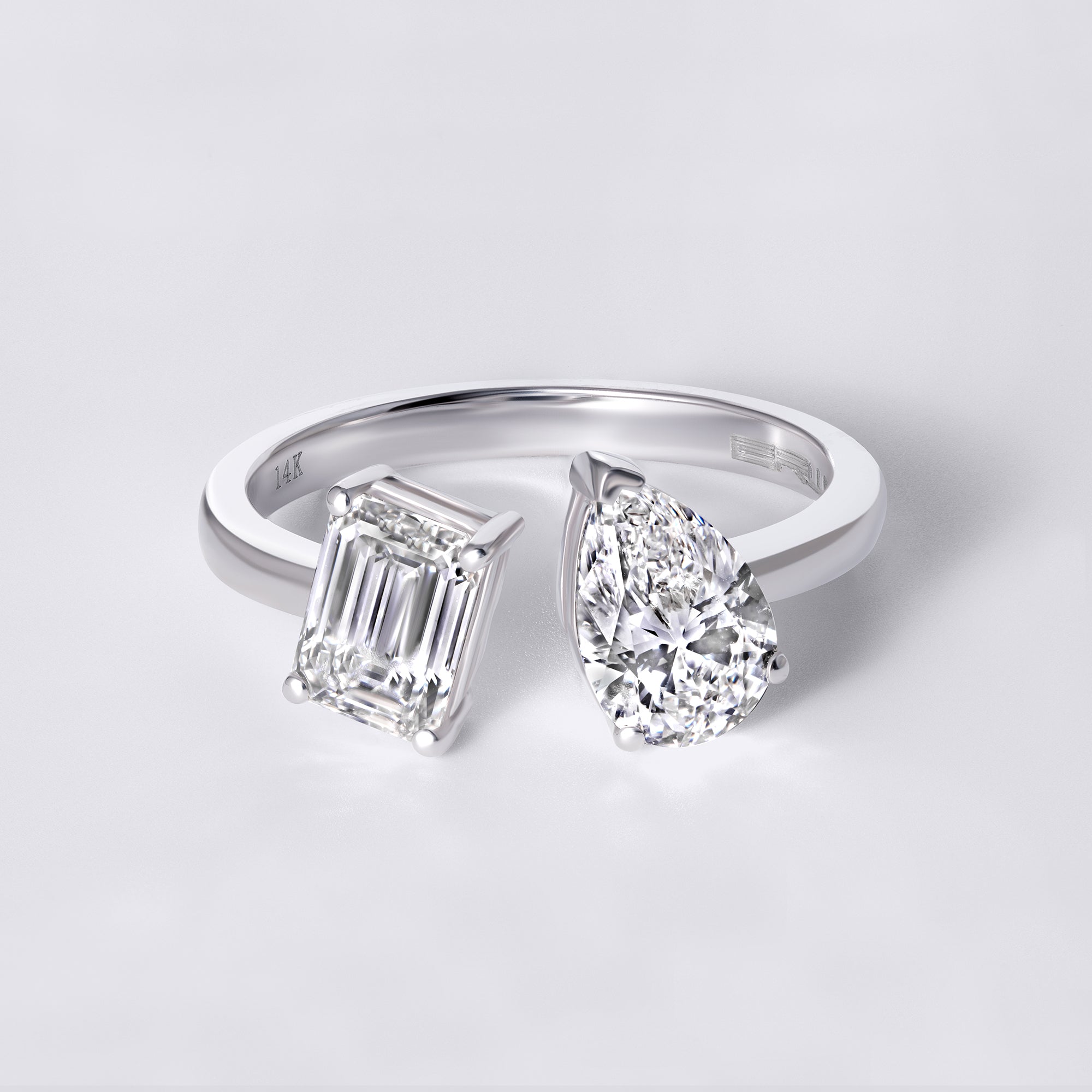Pear and Emerald Cut Diamond Toi et Moi Ring