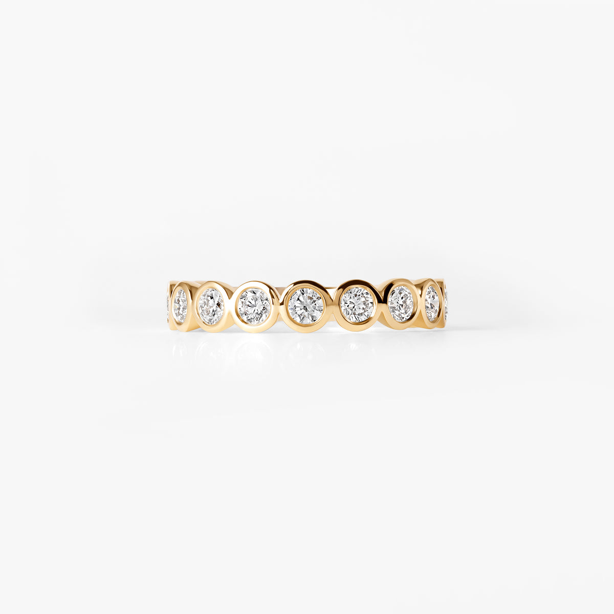 Round Diamond Bezel Set Three Quarter Eternity Band