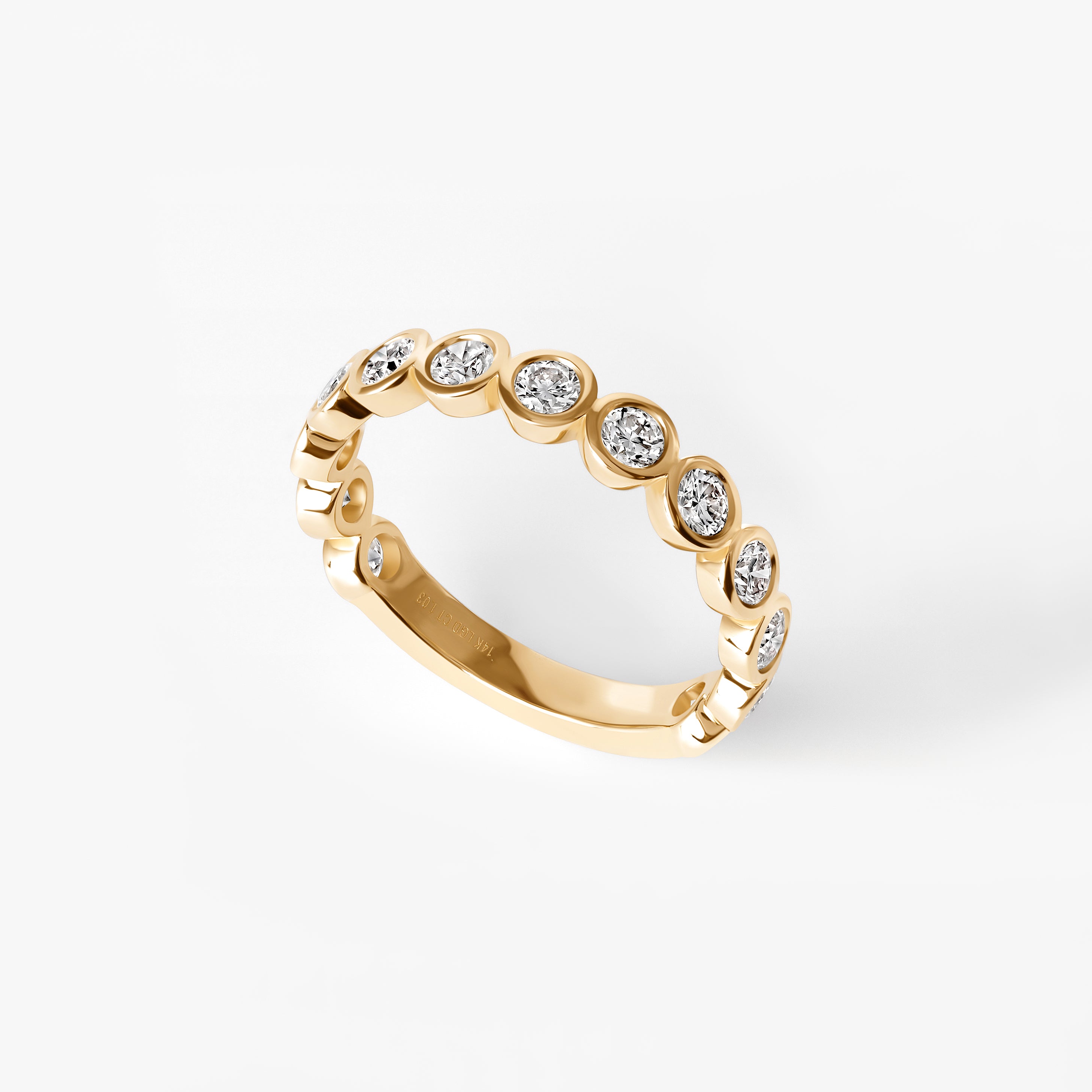 Round Diamond Bezel Set Three Quarter Eternity Band