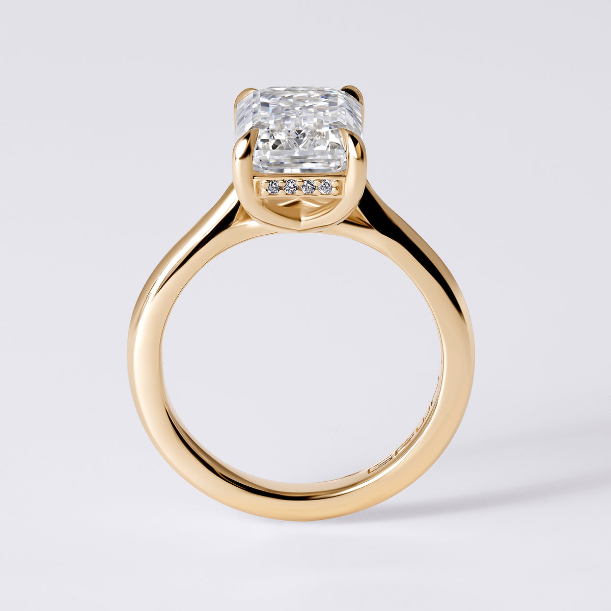 SORA 4.08CTW (4.02CT) EMERALD UNDERHALO CARESS ROUNDED SHANK, YELLOW GOLD