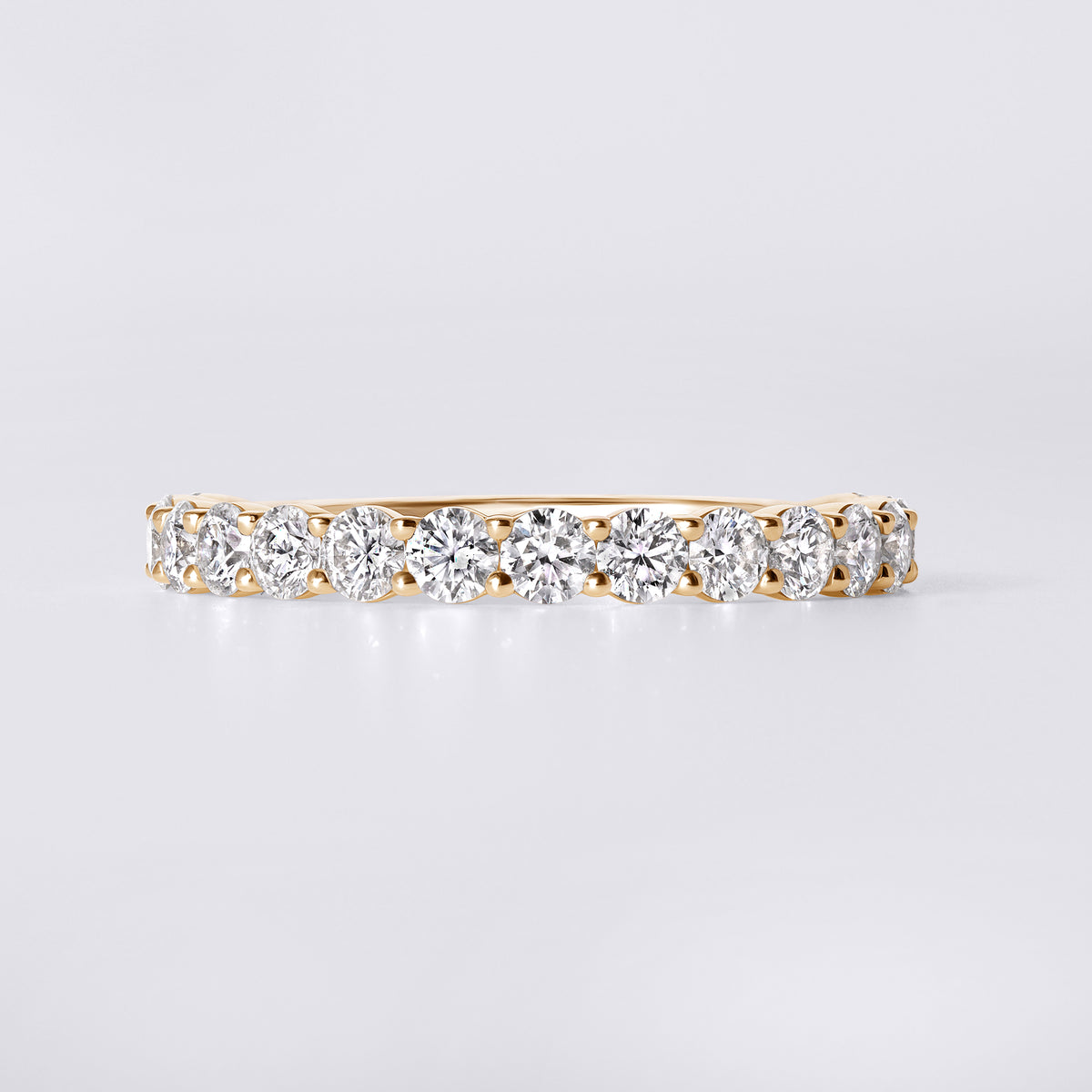 Round Diamond Shared Prong Set Three Quarter Eternity Band
