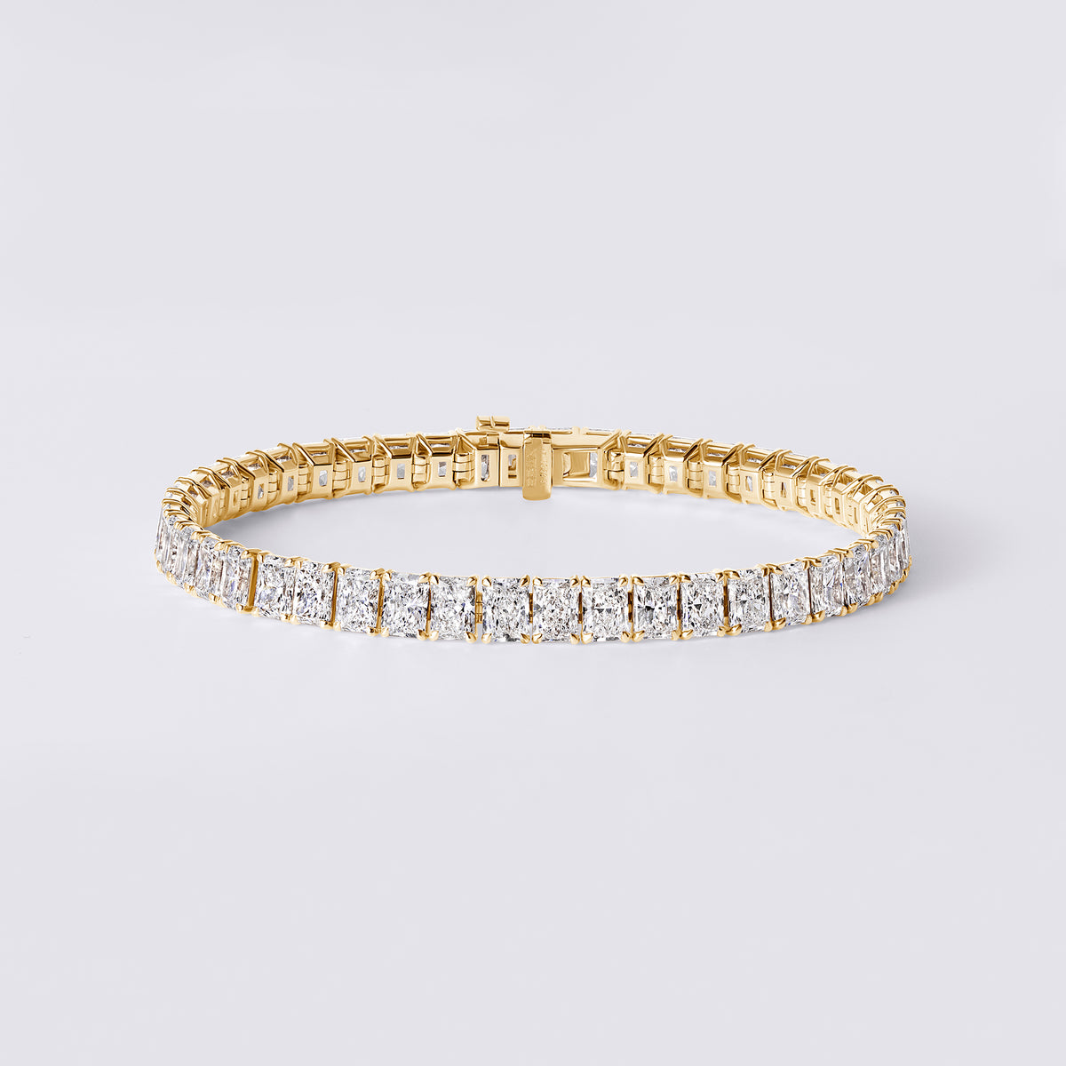 Radiant Cut 4 Prong Tennis Bracelet (16 7/8CTW), Yellow Gold