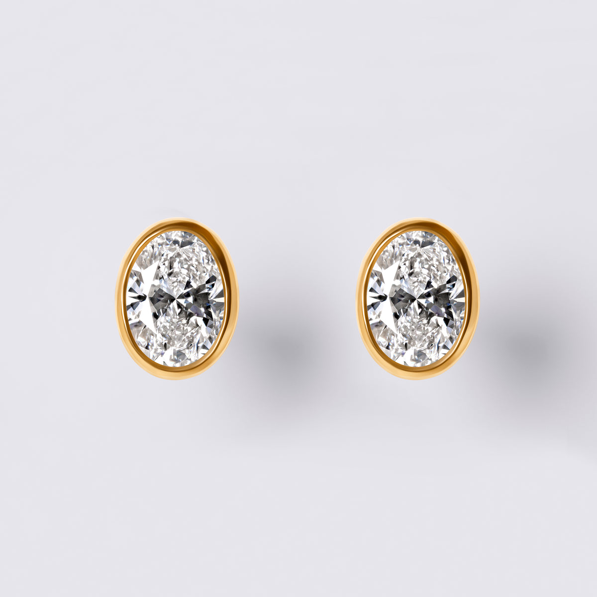 Oval Bezel Set Studs (2CTW), Yellow Gold