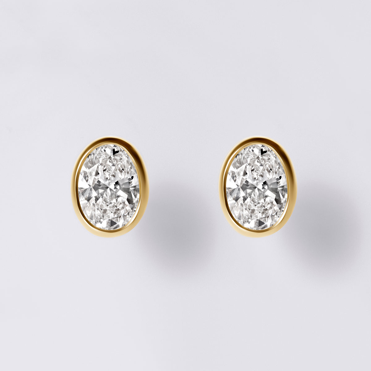 Oval Bezel Set Studs (2CTW), Yellow Gold