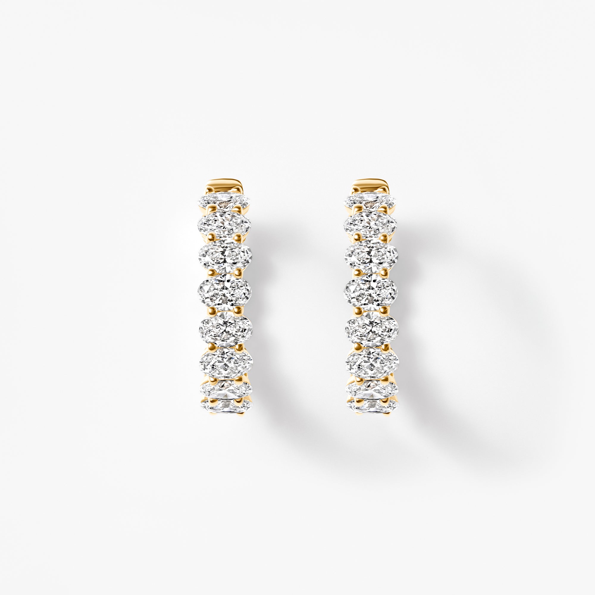 Oval Diamond Inside Out Huggie Earrings