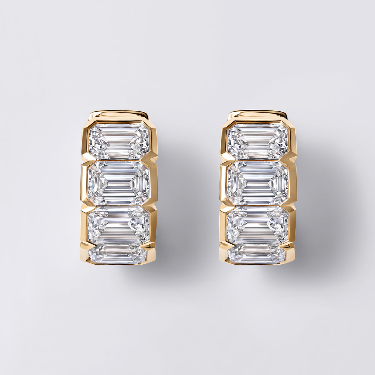 Emerald Cut Diamond East/West Half Bezel Huggie Earrings