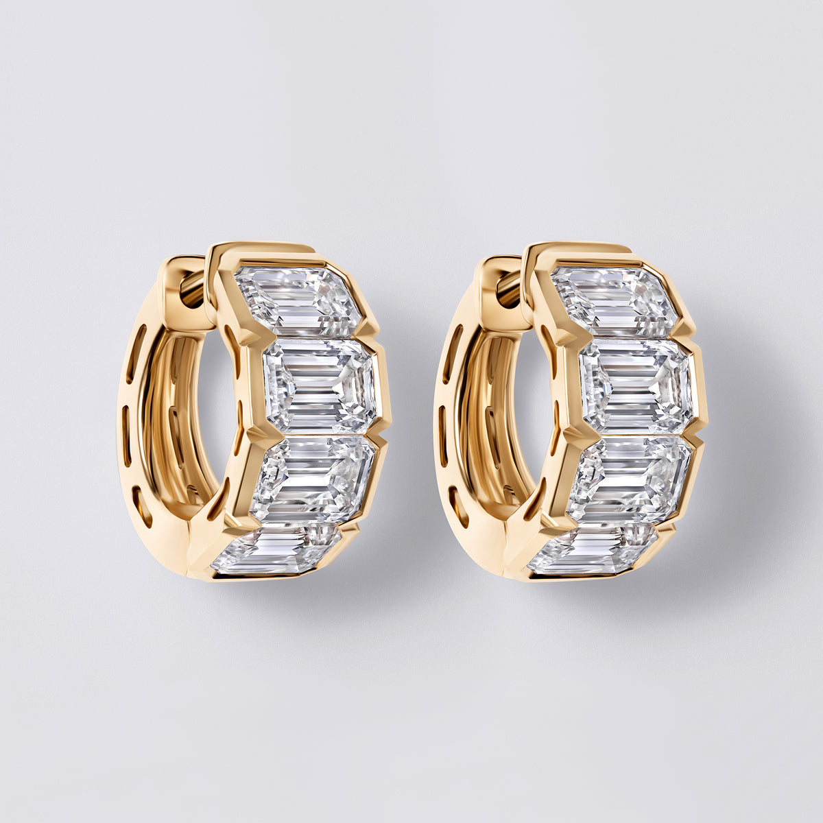 Emerald Cut Diamond East/West Half Bezel Huggie Earrings
