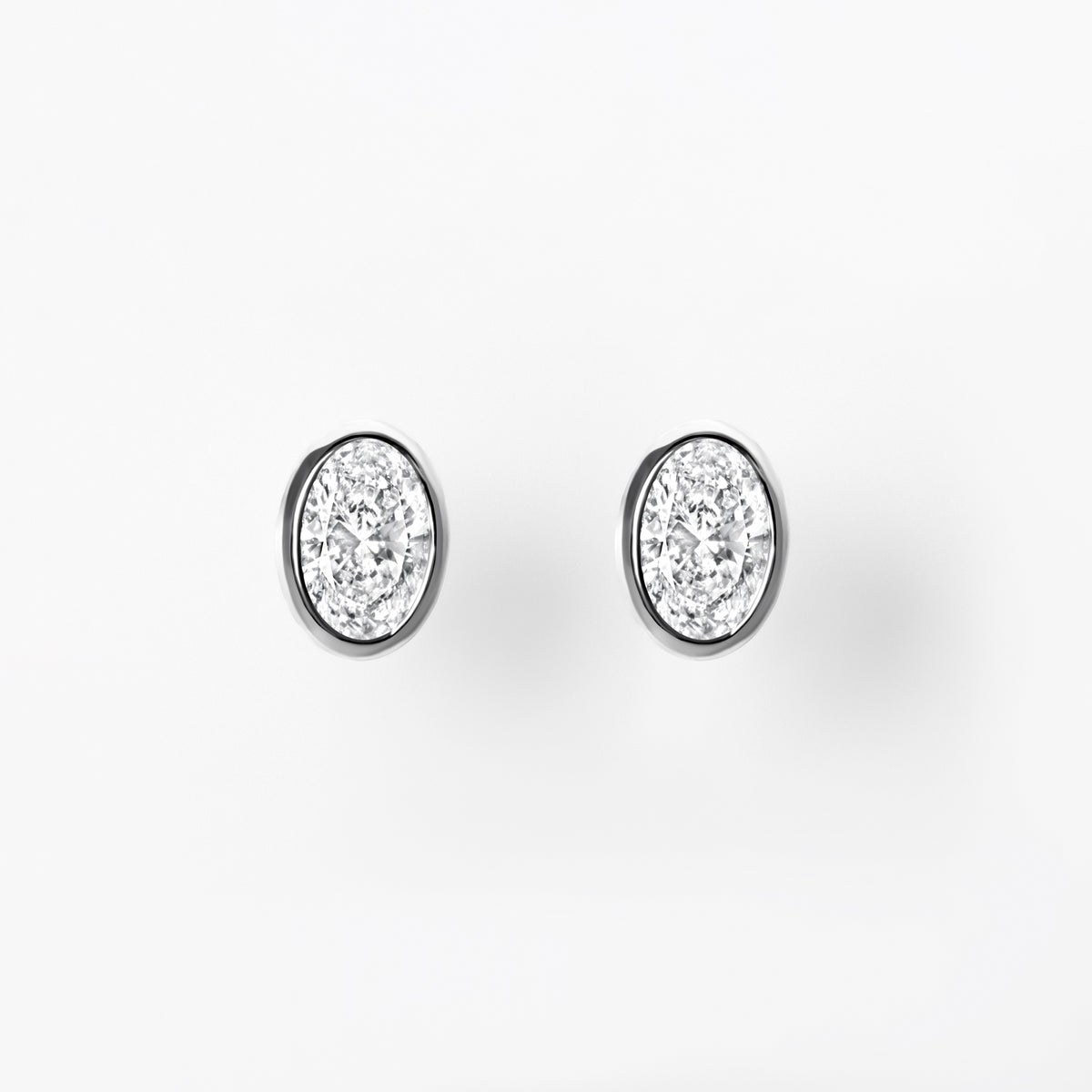 Bezel Set Oval Diamond Stud Earrings