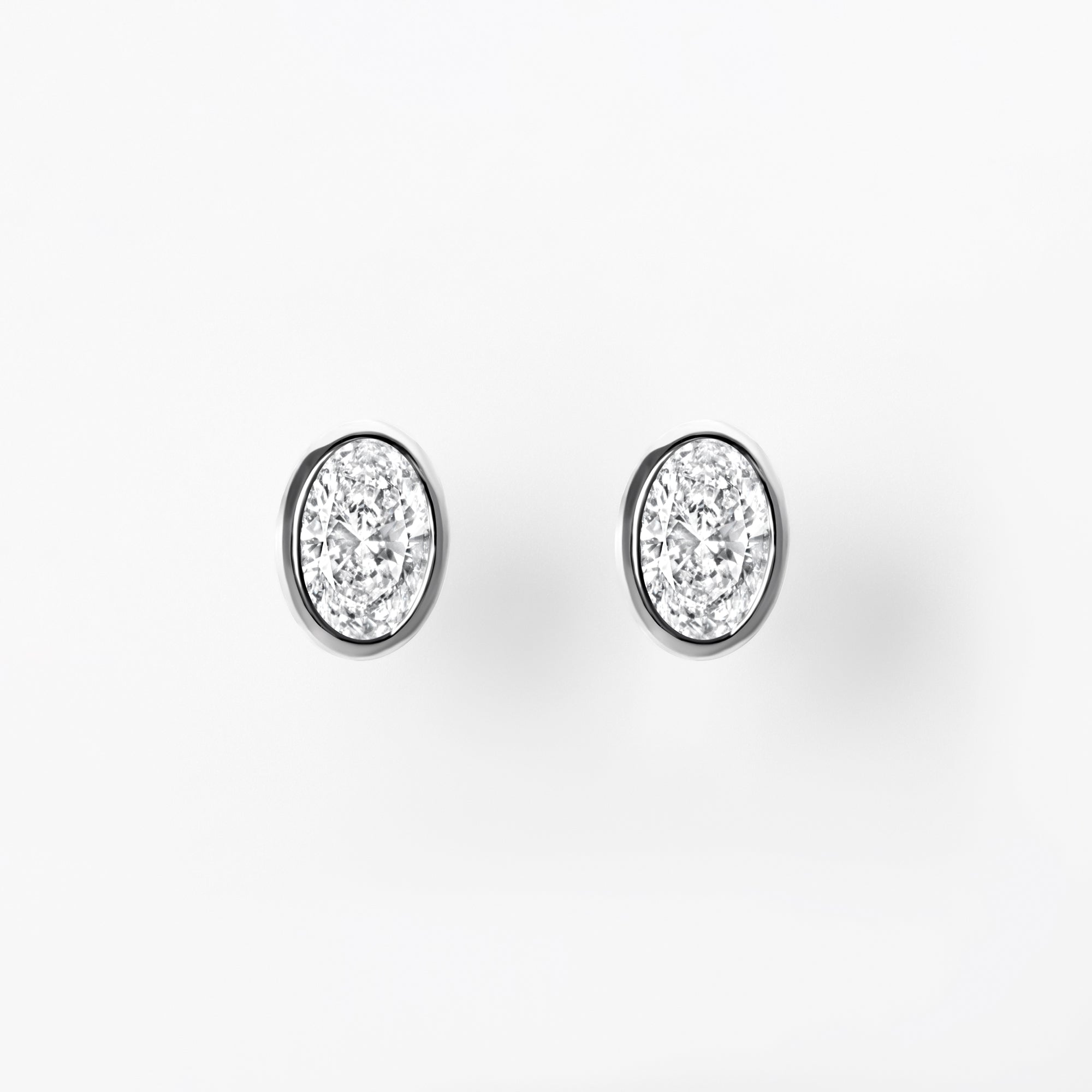 Bezel Set Oval Diamond Stud Earrings
