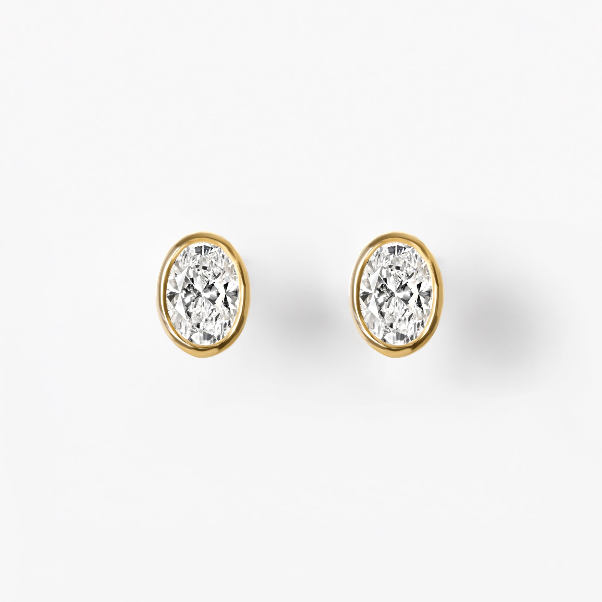 Bezel Set Oval Diamond Stud Earrings