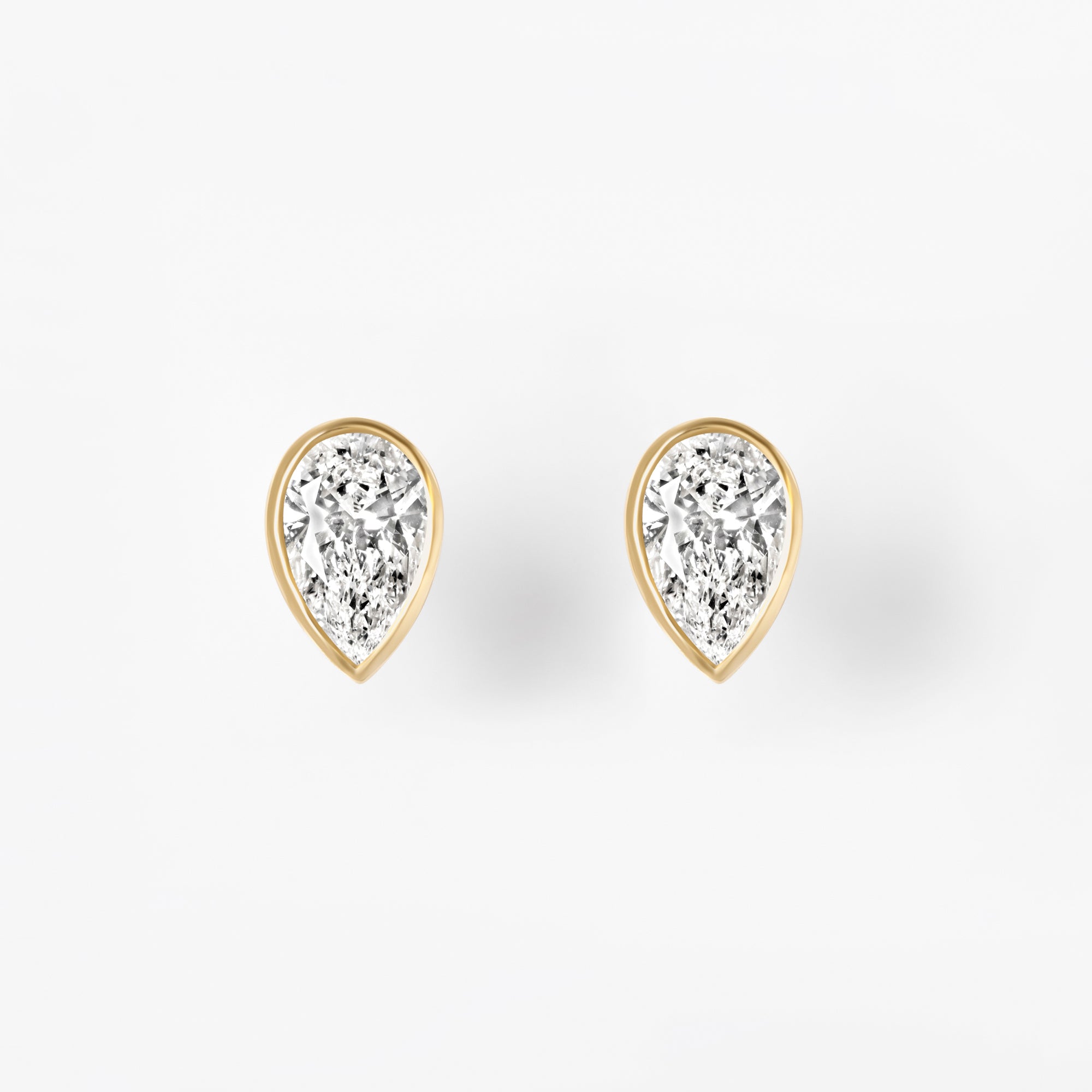 Bezel Set Pear Diamond Stud Earrings