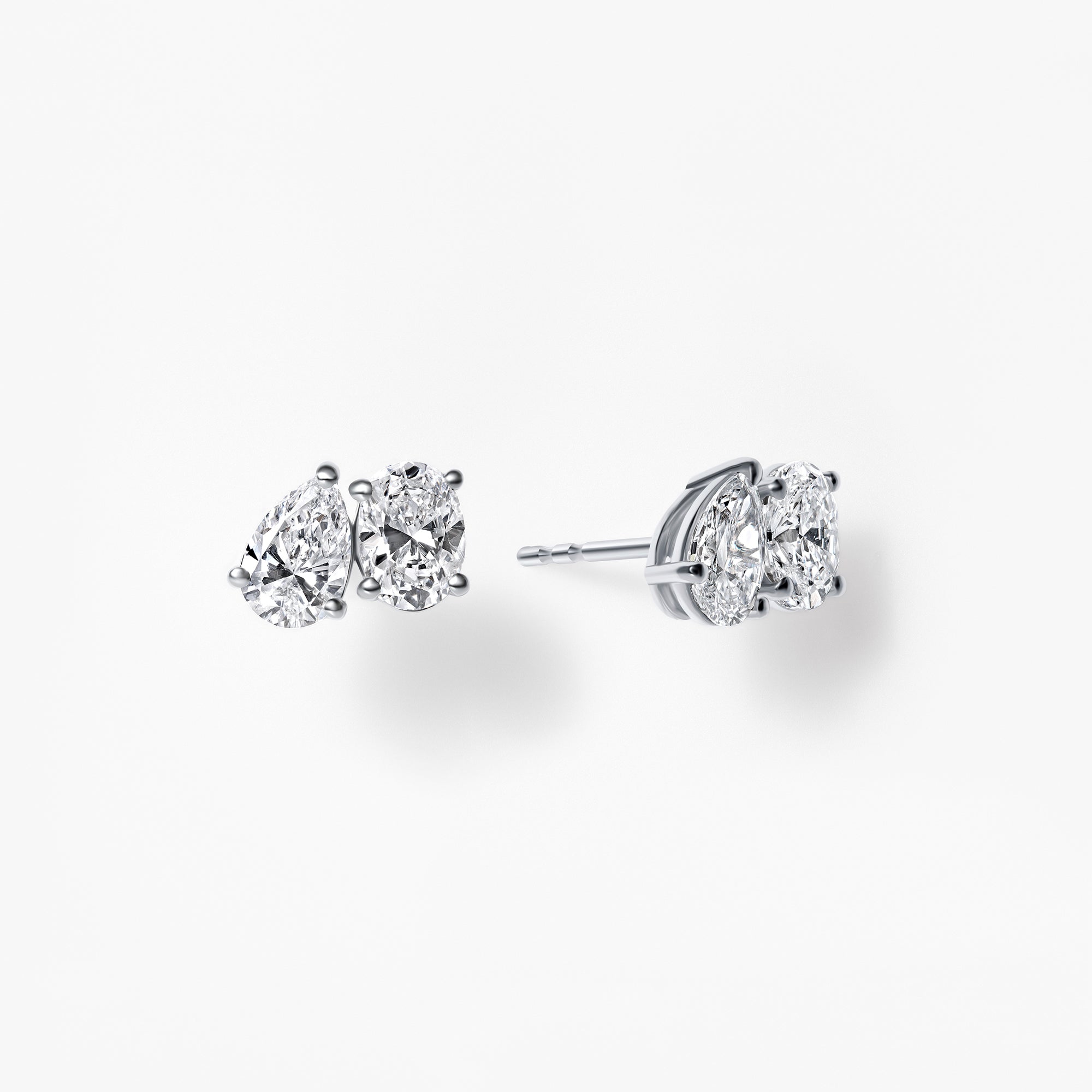 Oval and Pear Diamond Toi et Moi Stud Earrings