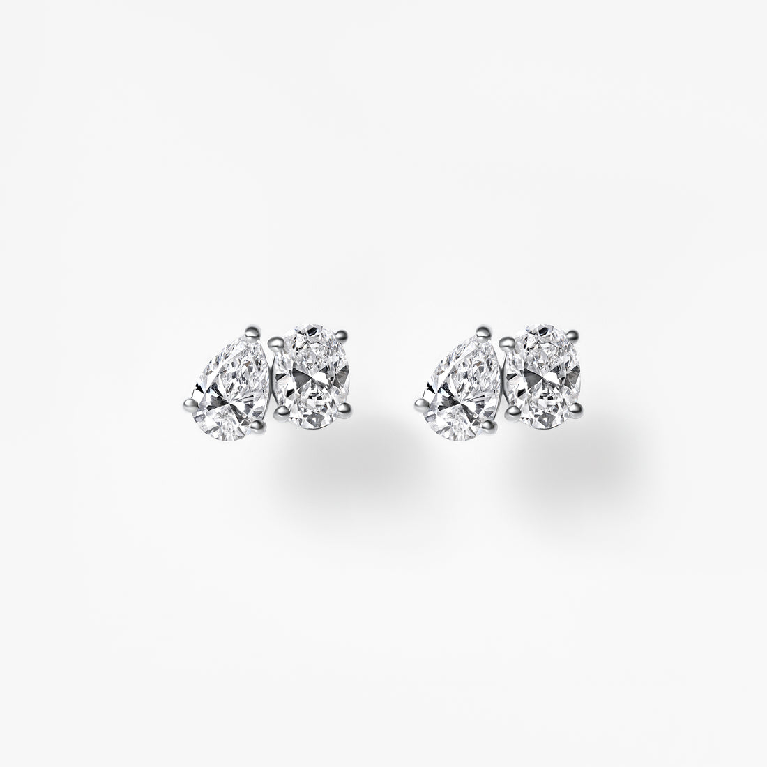 Oval and Pear Diamond Toi et Moi Stud Earrings