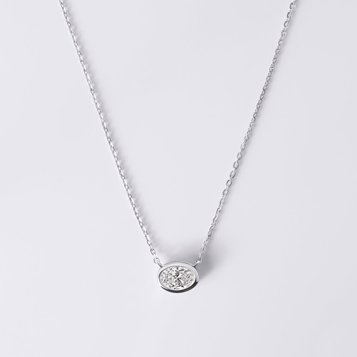 Oval Shaped Bezel Set Pendant Necklace (1CTW), White Gold