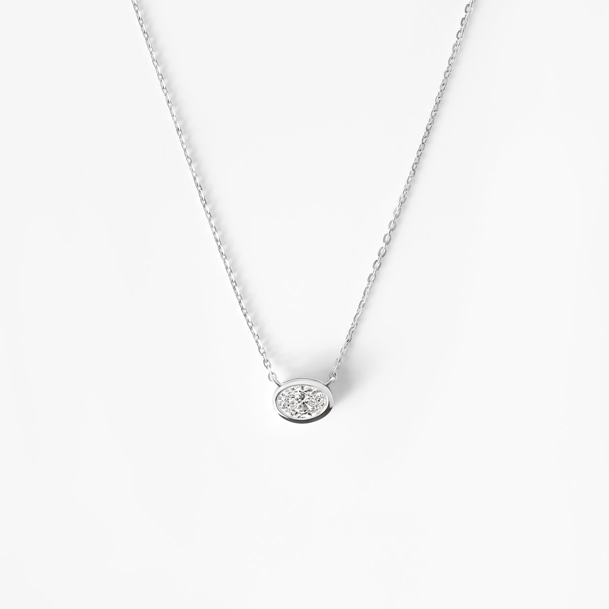 Oval Diamond Bezel Set Pendant Necklace