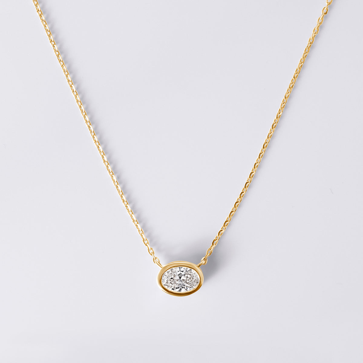 Oval Shaped Bezel Set Pendant Necklace (1CTW), Yellow Gold