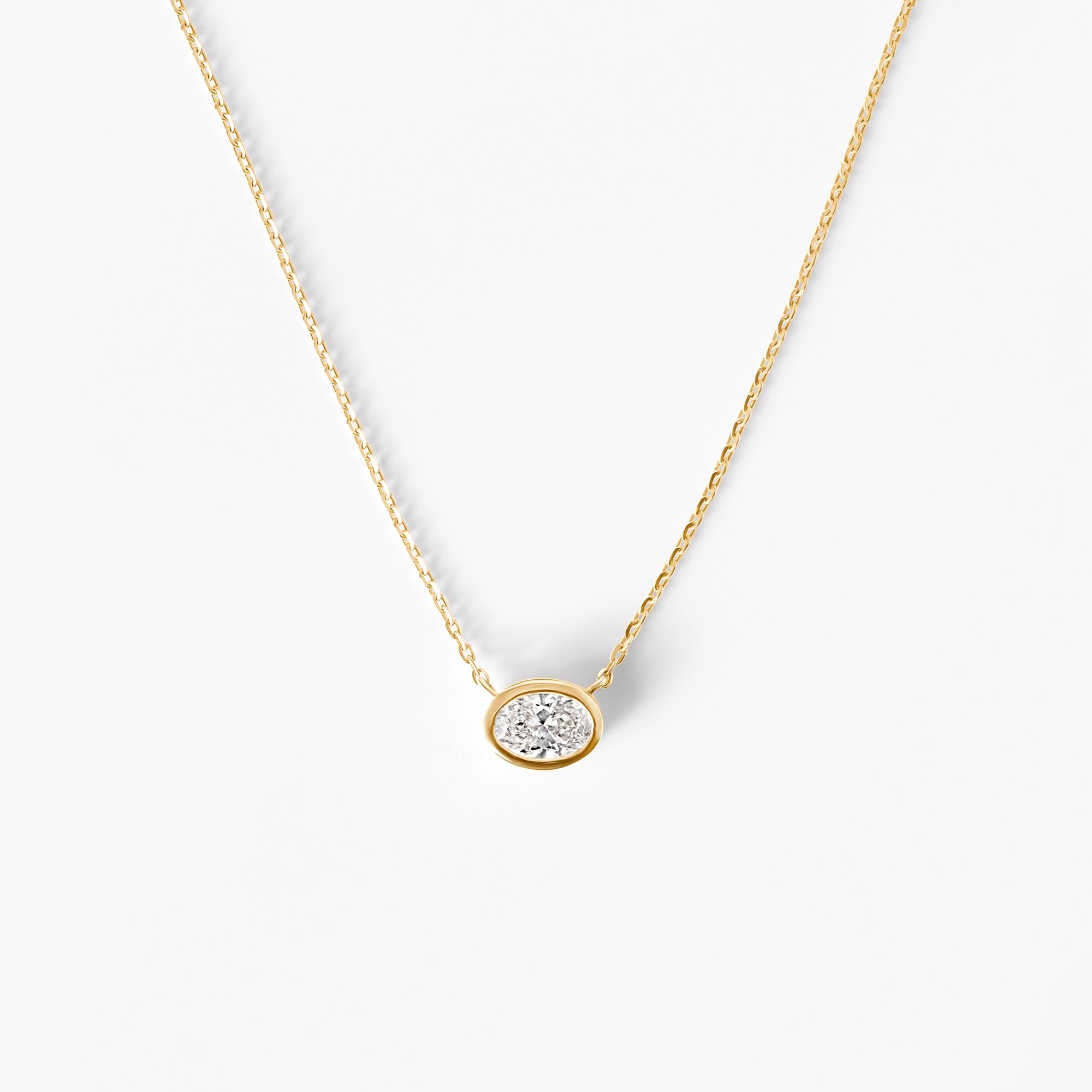 Oval Diamond Bezel Set Pendant Necklace