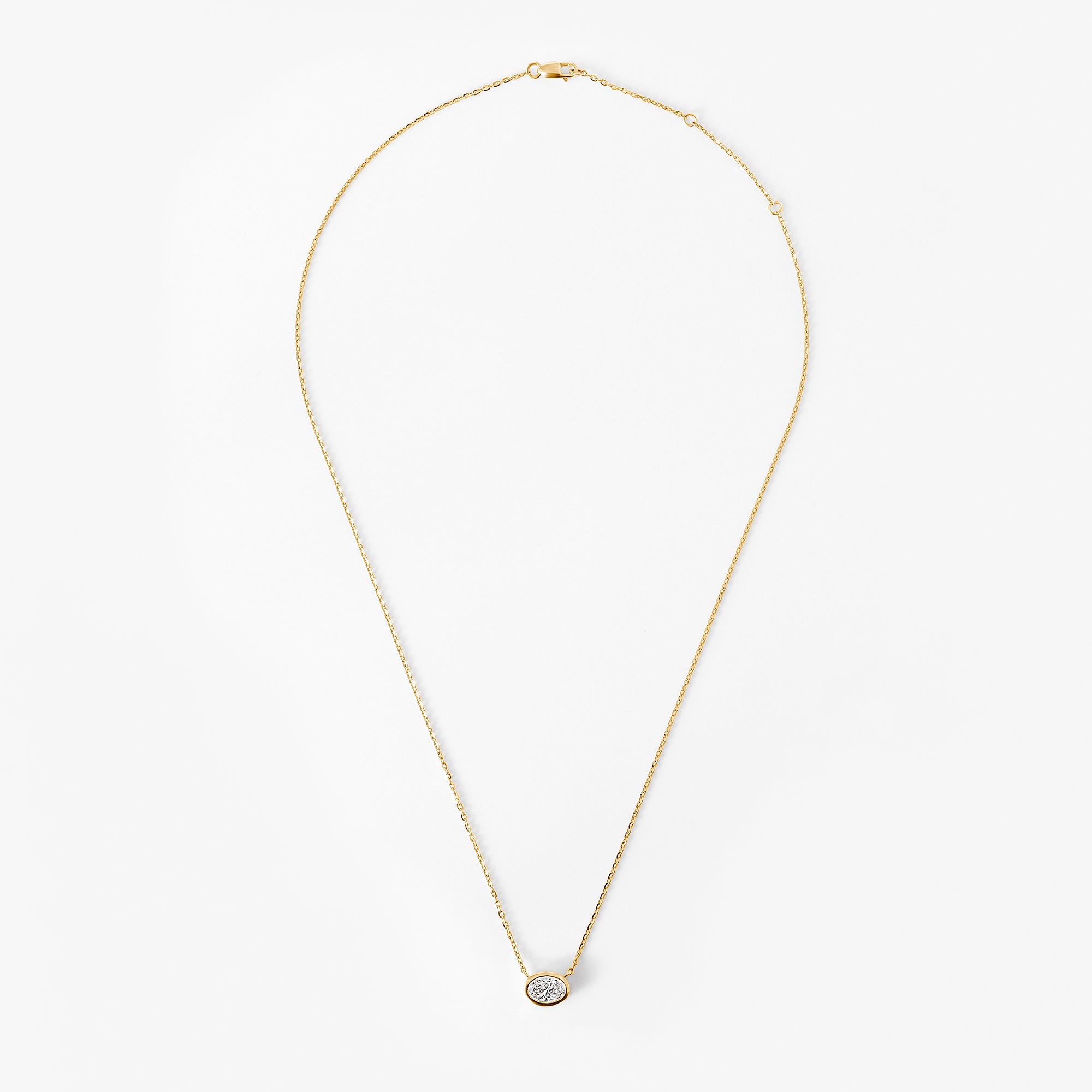 Oval Diamond Bezel Set Pendant Necklace