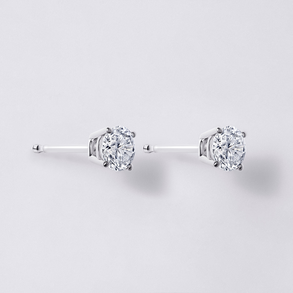 1/2 Carat Round Studs in 14K F/G VS+ With Friction Backs (GWP)
