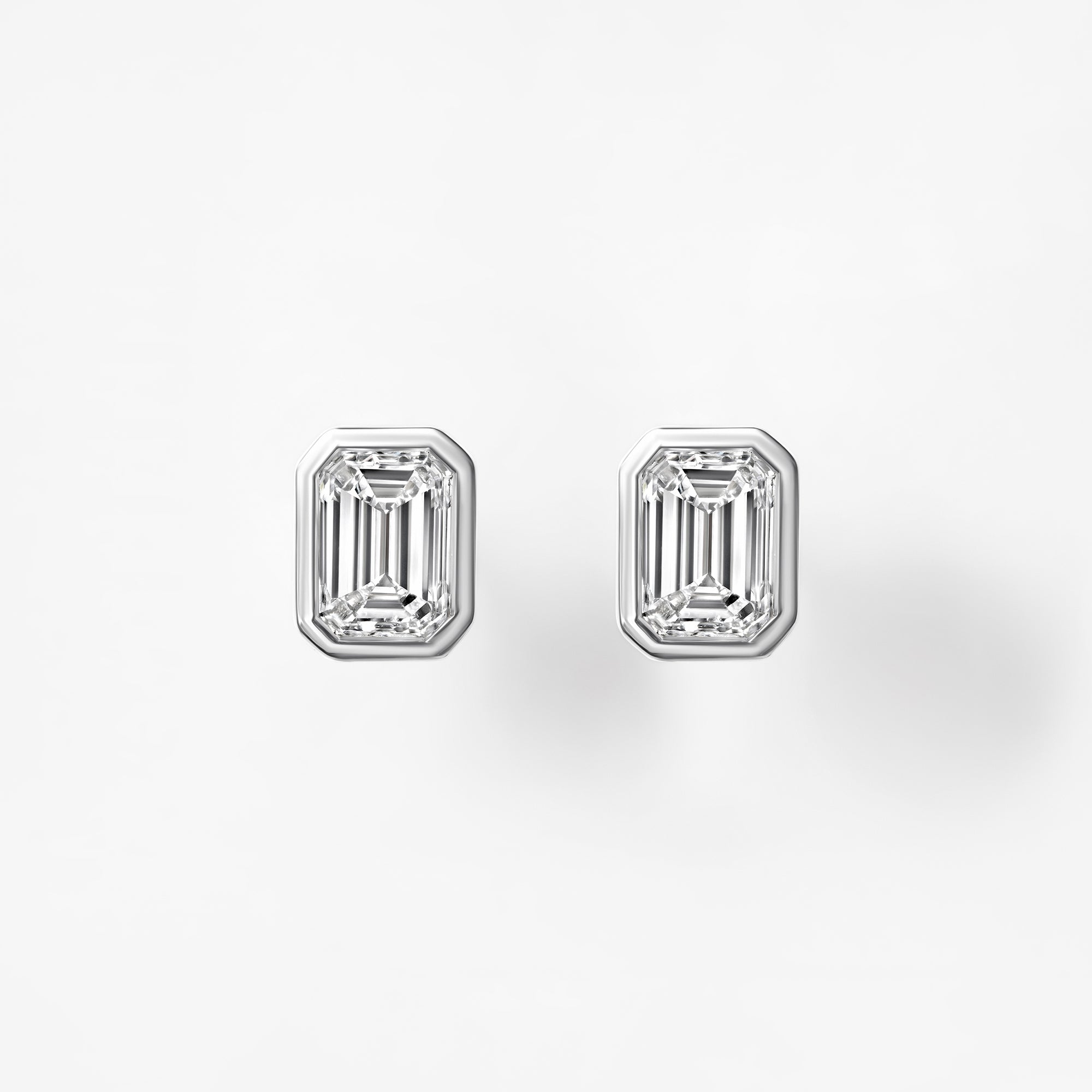 Bezel Set Emerald Cut Diamond Stud Earrings