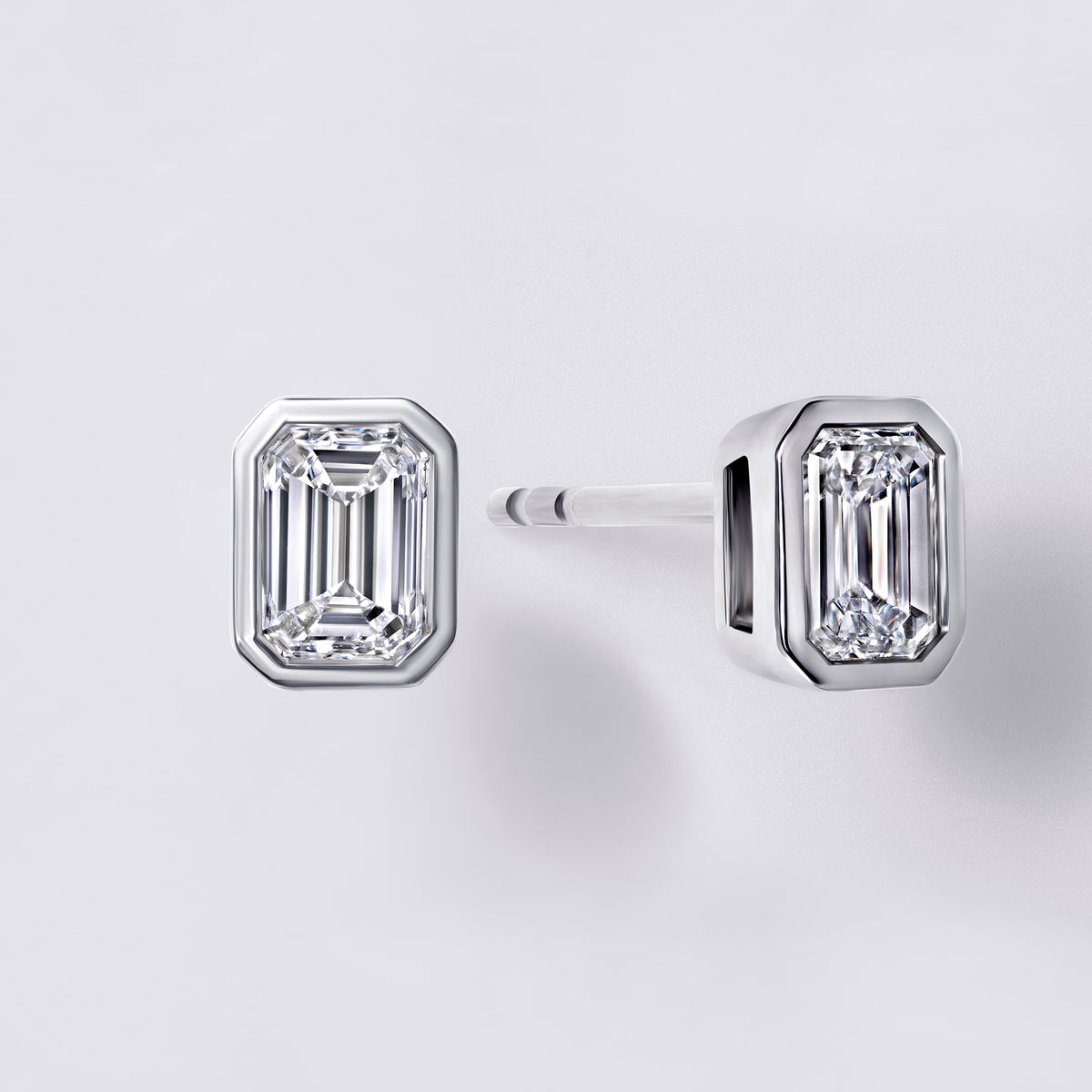 Bezel Set Emerald Lab Diamond Stud Earrings, White Rhodium