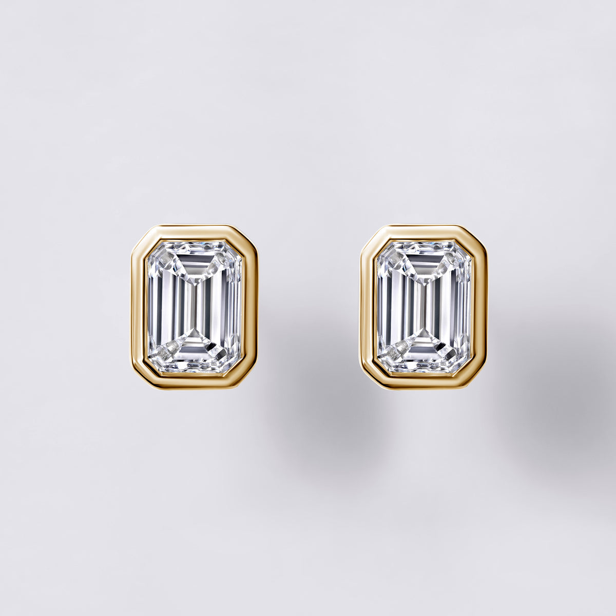 Bezel Set Emerald Lab Diamond Stud Earrings, Yellow Gold Vermeil