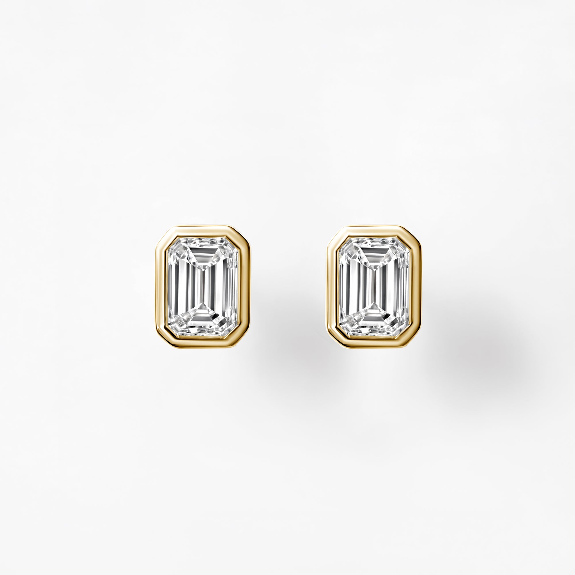 Bezel Set Emerald Cut Diamond Stud Earrings