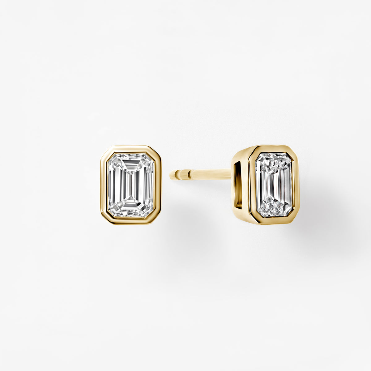 Bezel Set Emerald Cut Diamond Stud Earrings