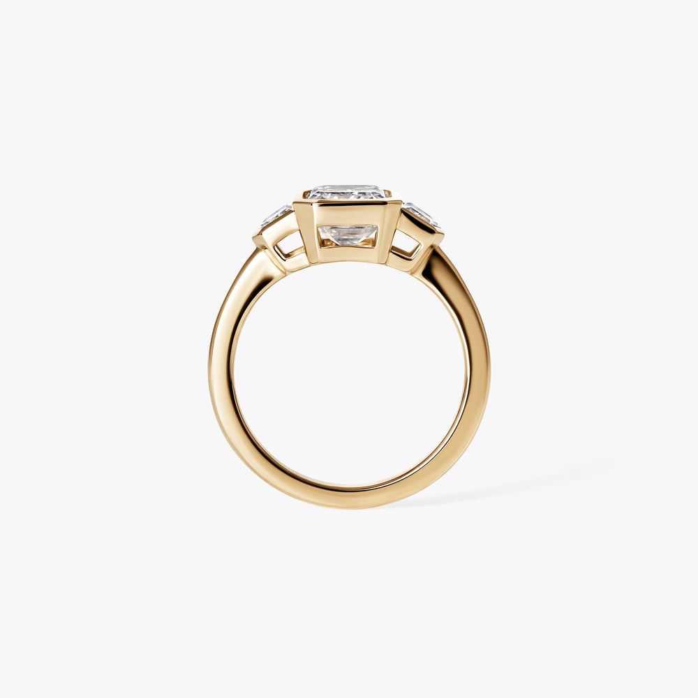 2.57CT Emerald and Cadillac Bezel Three Stone Engagement Ring