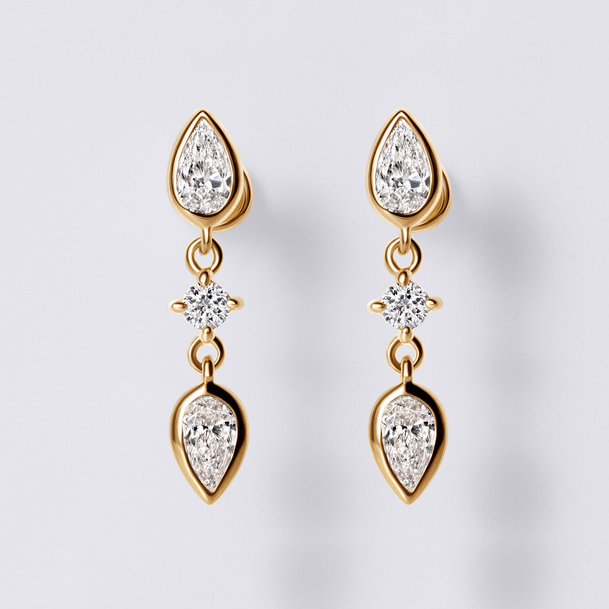 Pear Diamond Bezel Set Triple Drop Earrings